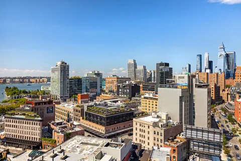 a view of a city with tall buildings