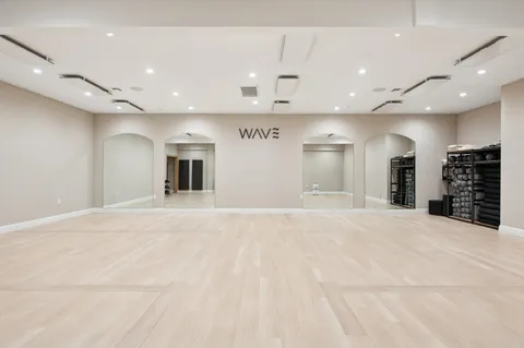 a bedroom with a bed and a cabinets