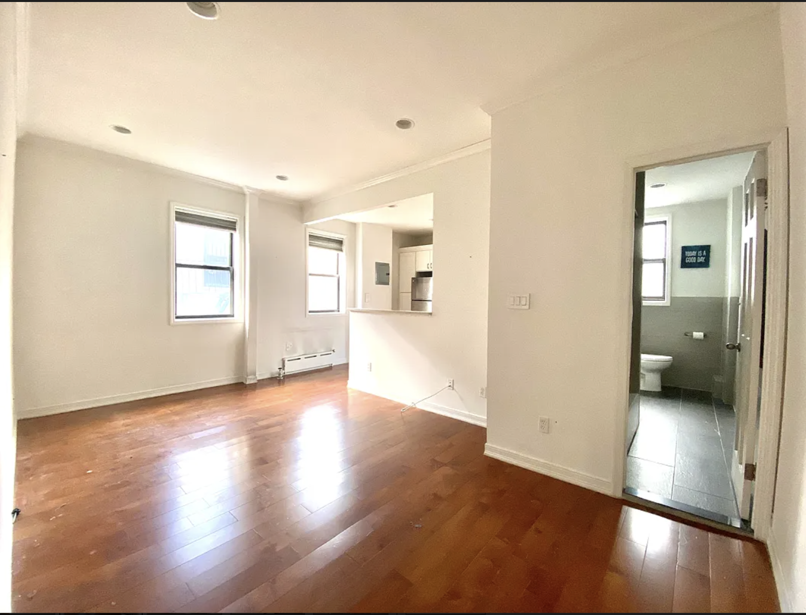 567 6th Street, Unit 10 Brooklyn, NY 11215 - Photo 3 of 14 a view of a living room with hardwood floor and a window