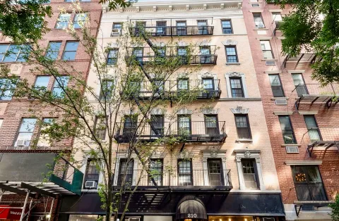 a view of a street with some trees