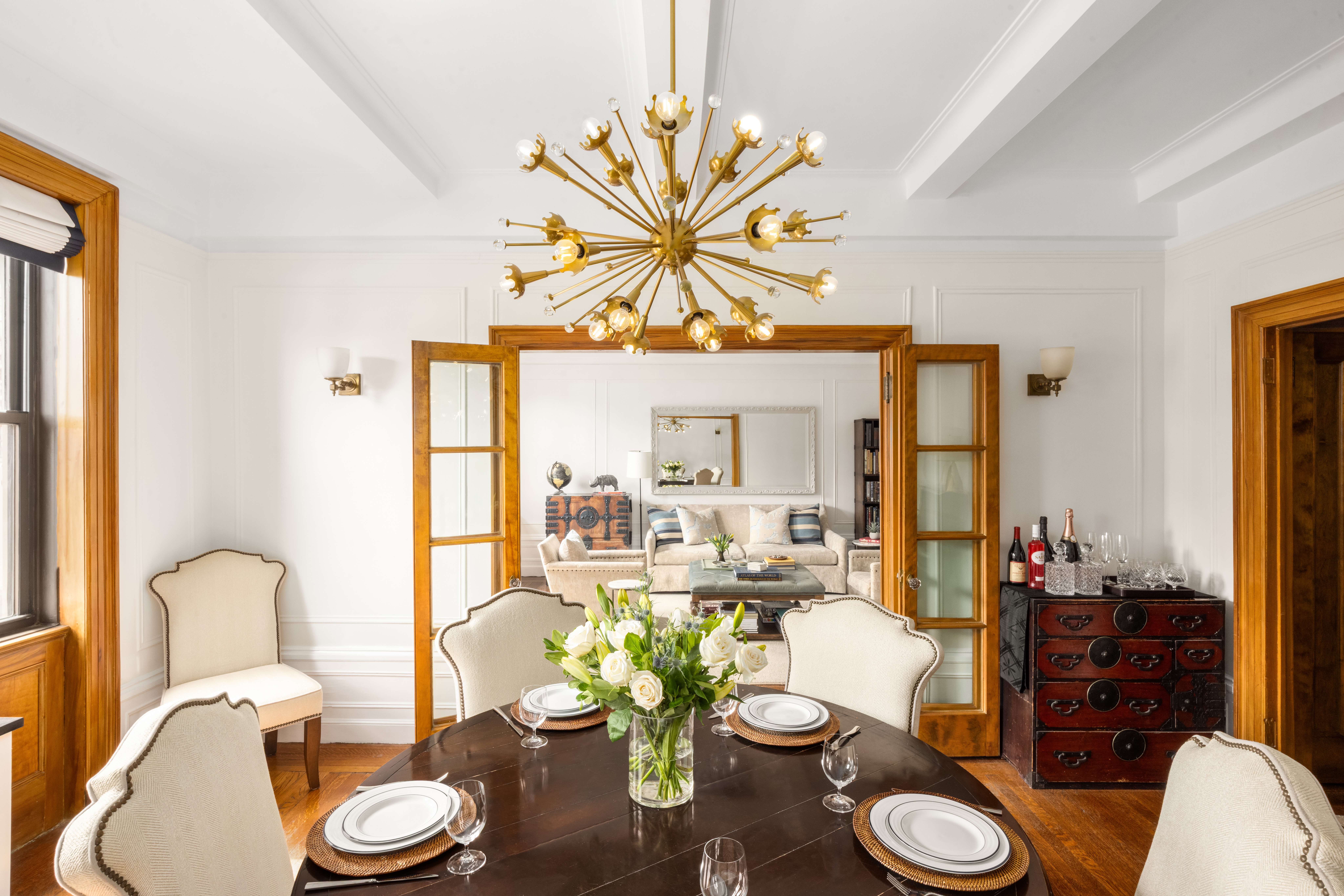 119 West 71st Street, Unit 9B Manhattan, NY 10023 - Photo 4 of 18 a living room with furniture and a table