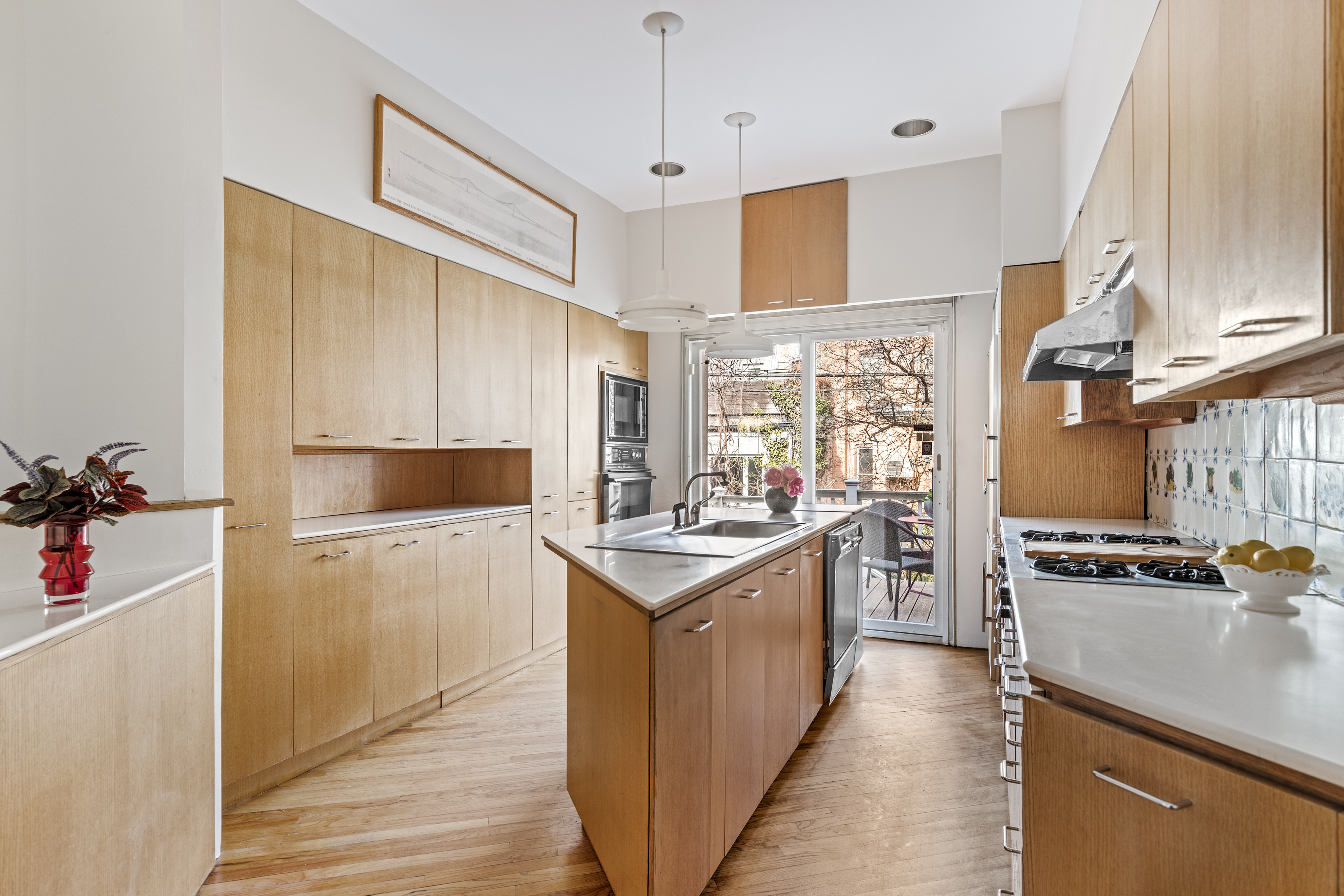 599 2nd Street Brooklyn, NY 11215 - Photo 6 of 16 a kitchen with cabinets and stainless steel appliances