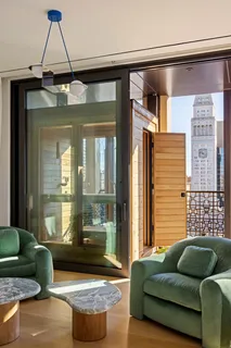 a living room with furniture and a window
