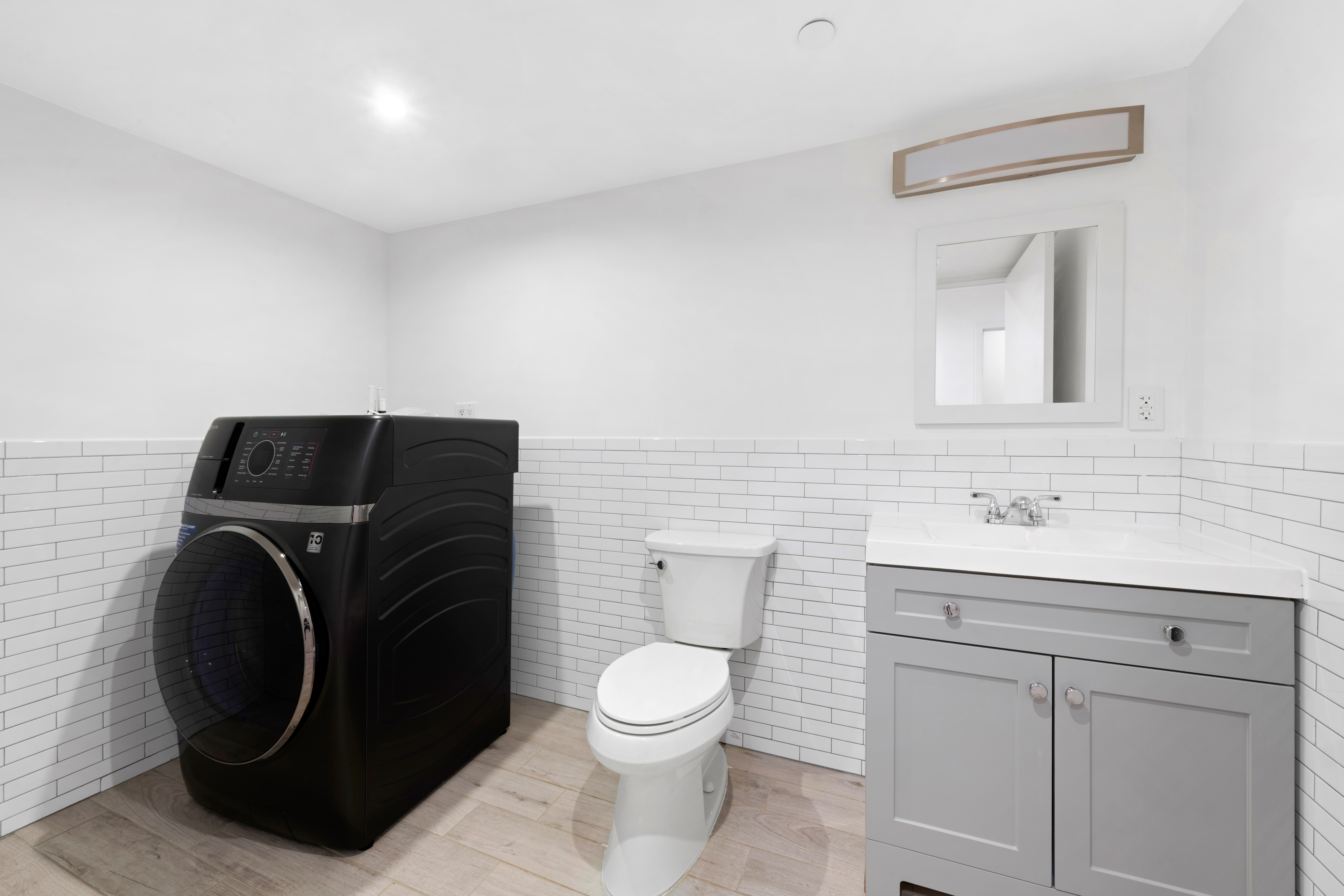 129 West 131st Street, Unit 1 Manhattan, NY 10027 - Photo 12 of 15 a bathroom with a toilet and a sink