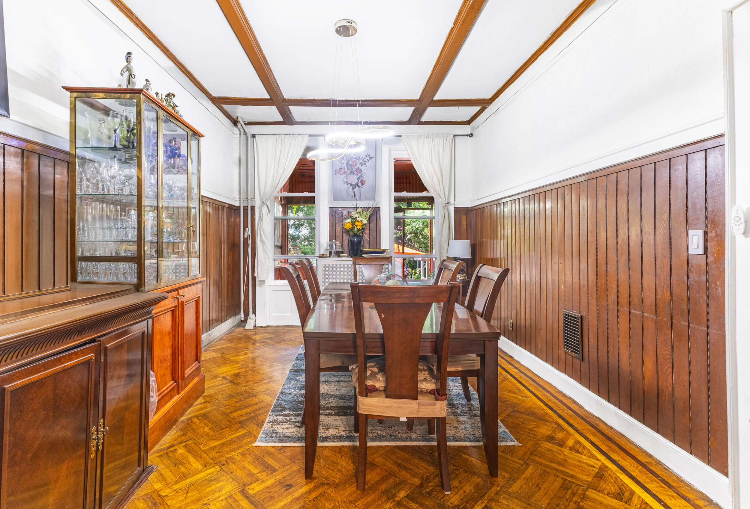 201 Maple Street Brooklyn, NY 11225 - Photo 9 of 21 a view of a dining room with furniture window and wooden floor