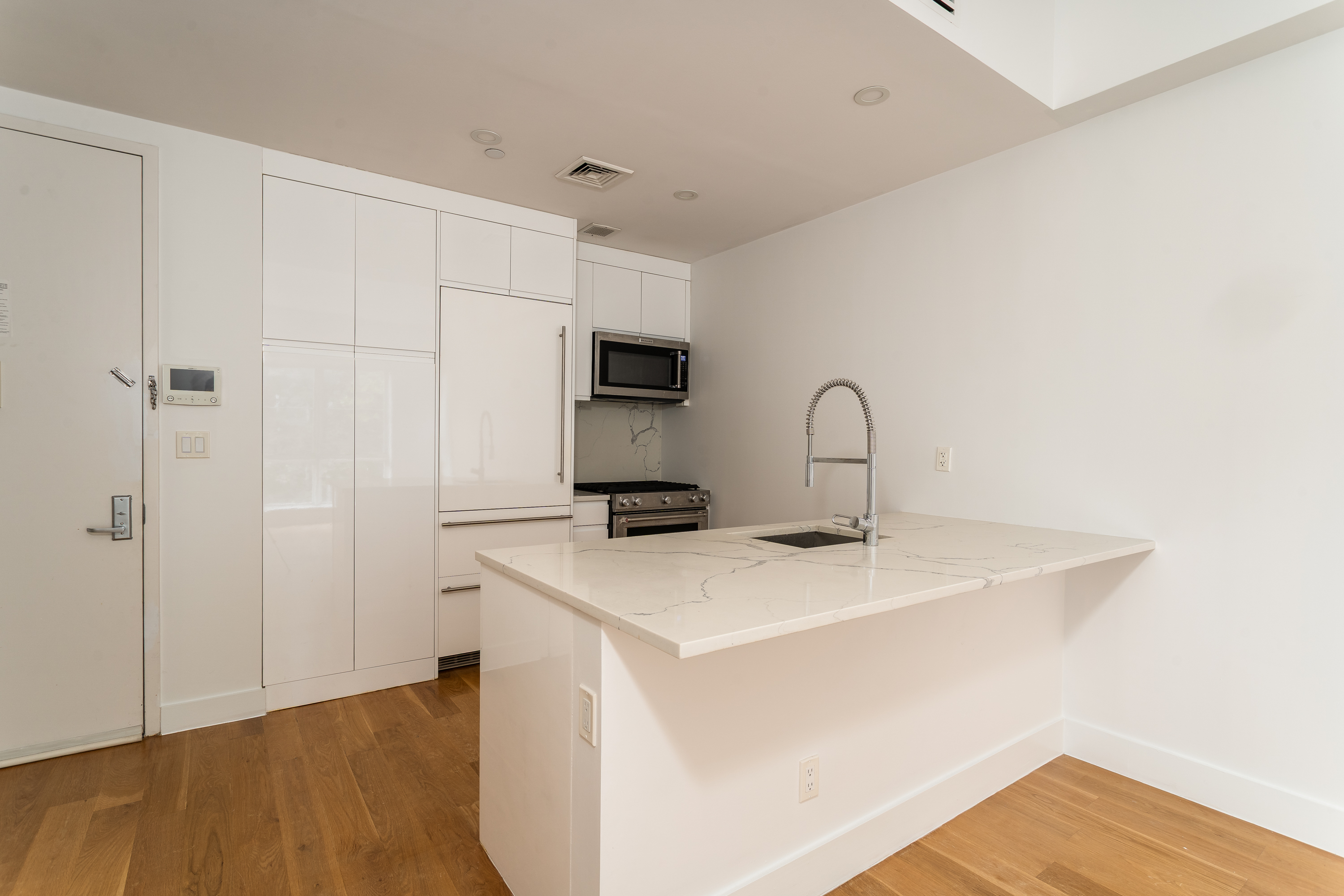 21 Powers Street, Unit 3A Brooklyn, NY 11211 - Photo 10 of 14 a close view of a sink a faucet and appliance in the kitchen