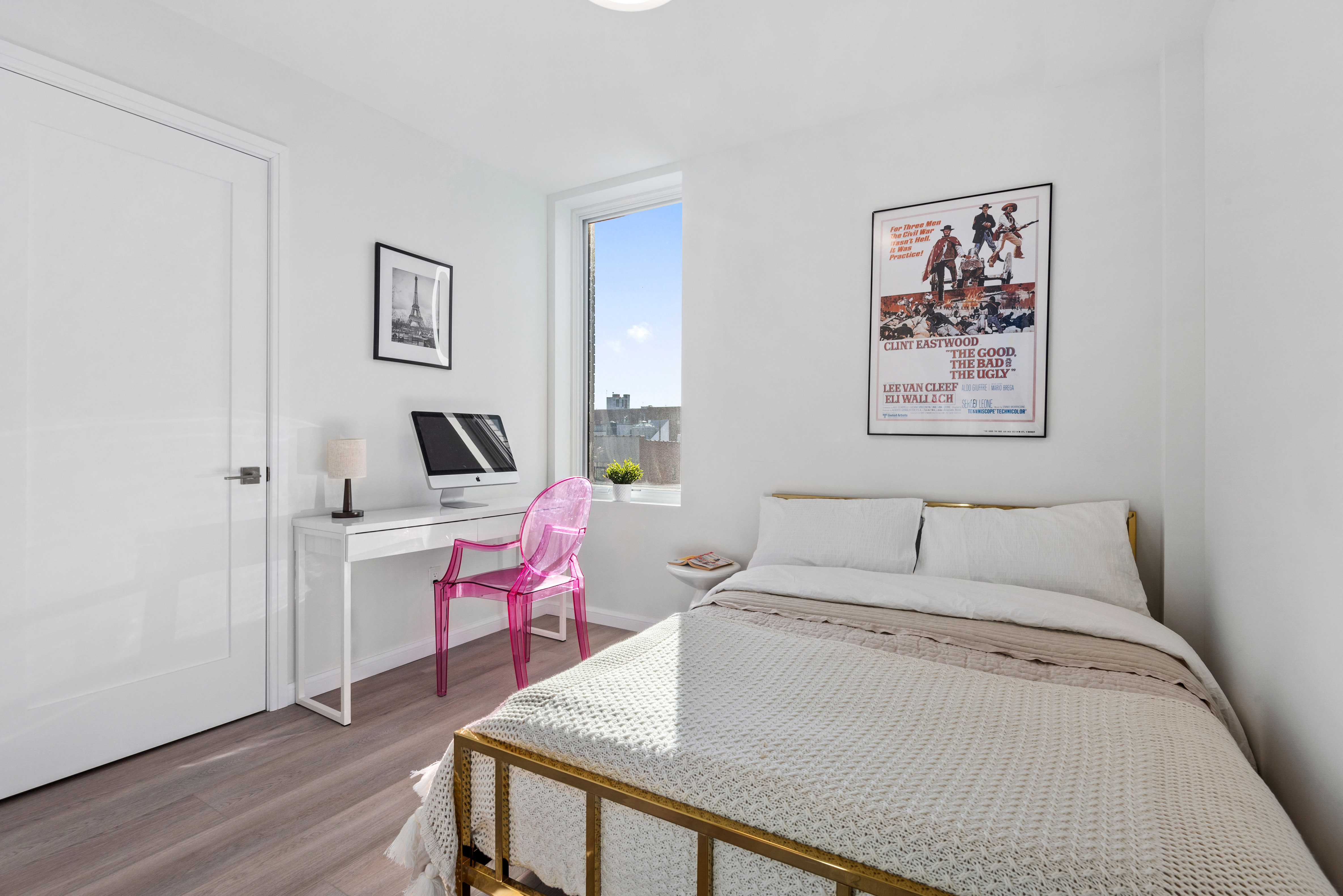 1 Lenox Road, Unit 5E Brooklyn, NY 11226 - Photo 12 of 13 a bedroom with a bed and a table in it