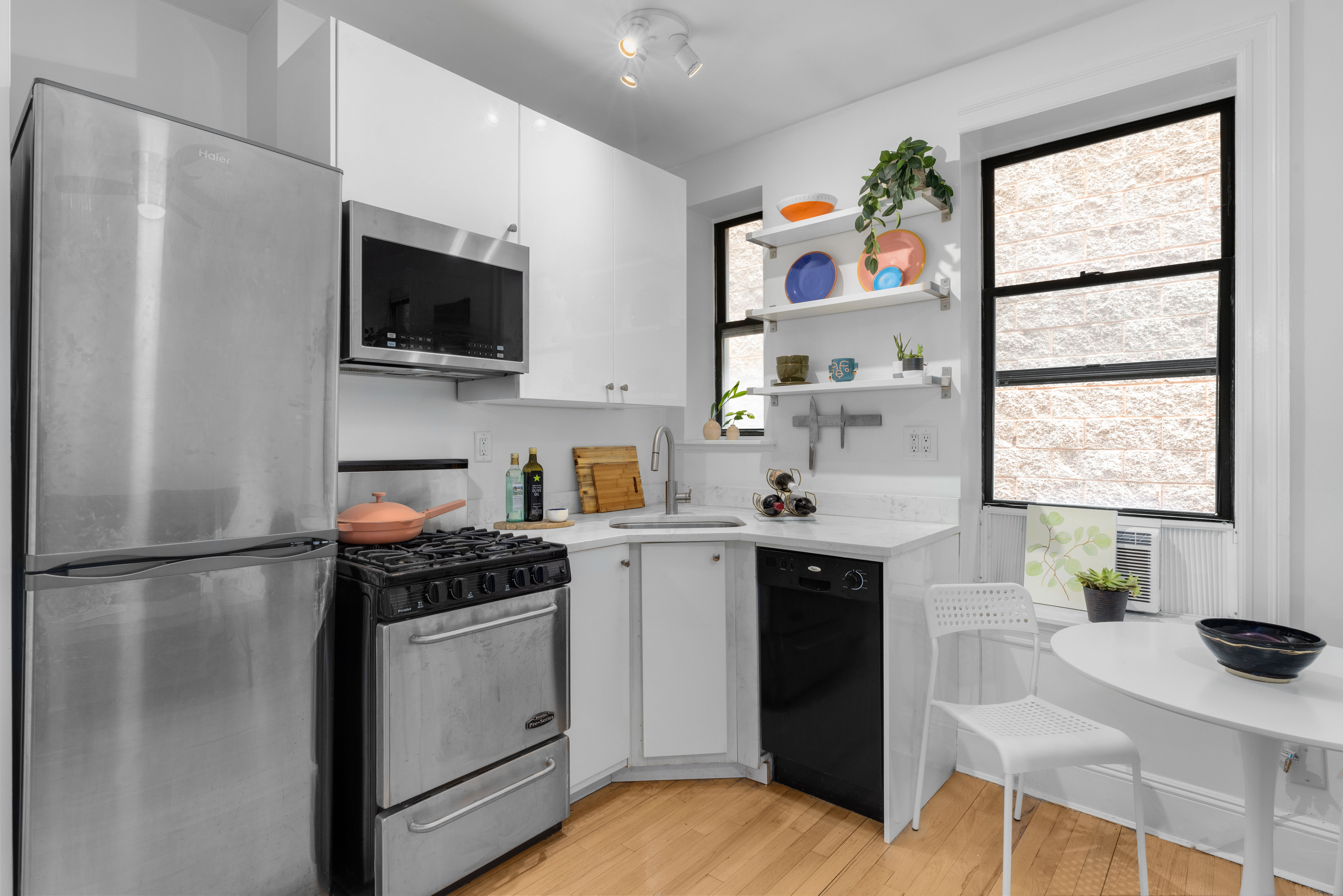 251 Pacific Street, Unit 8 Brooklyn, NY 11201 - Photo 3 of 9 a kitchen with stainless steel appliances a stove a sink and a refrigerator