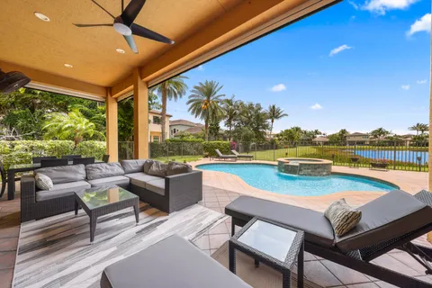 a view of a patio with swimming pool