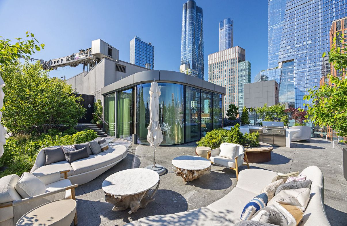 520 West 28th Street, Unit PH37 Manhattan, NY 10001 - Photo 18 of 45 a view of a patio with couches table and chairs and potted plants