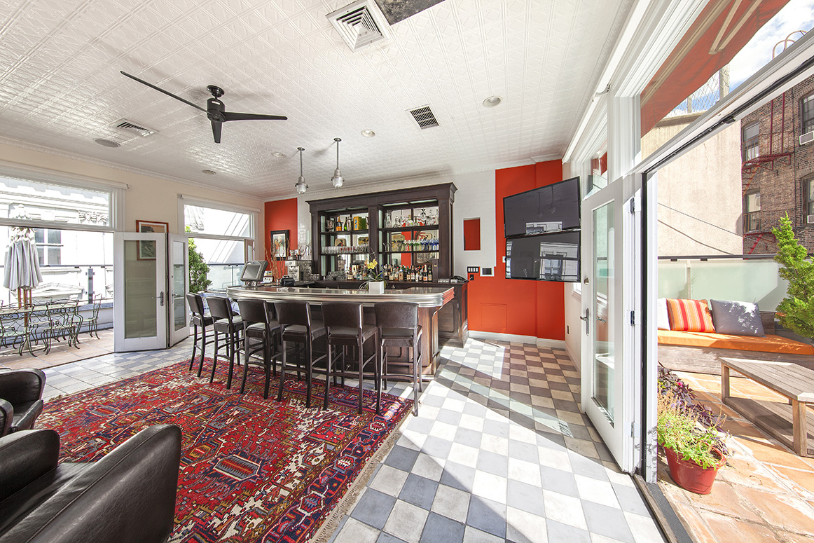 4 Centre Market Place Manhattan, NY 10013 - Photo 7 of 15 a living room filled with furniture and a large window