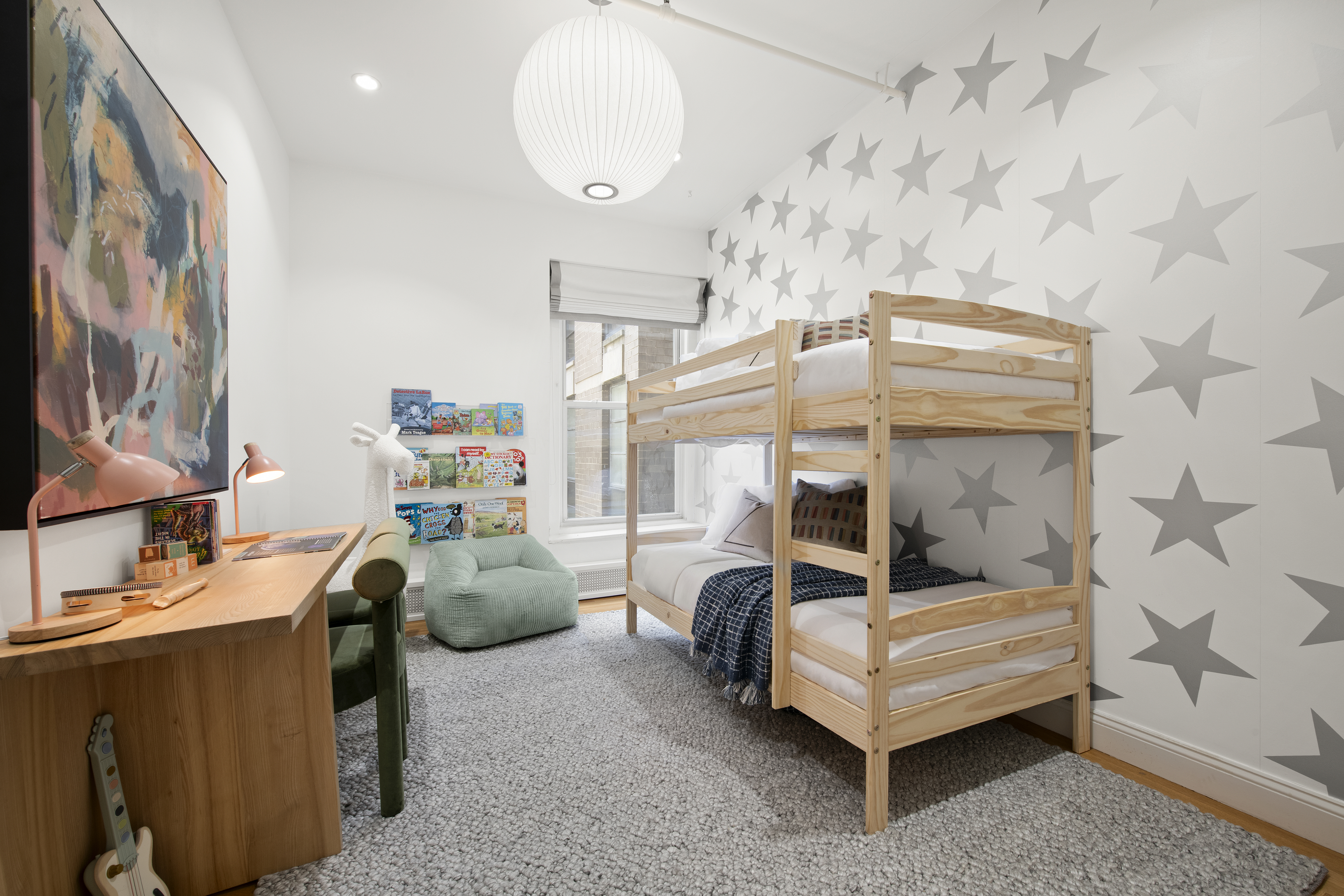 30 West 13th Street, Unit 4C Manhattan, NY 10011 - Photo 15 of 22 a bedroom with furniture and a chandelier