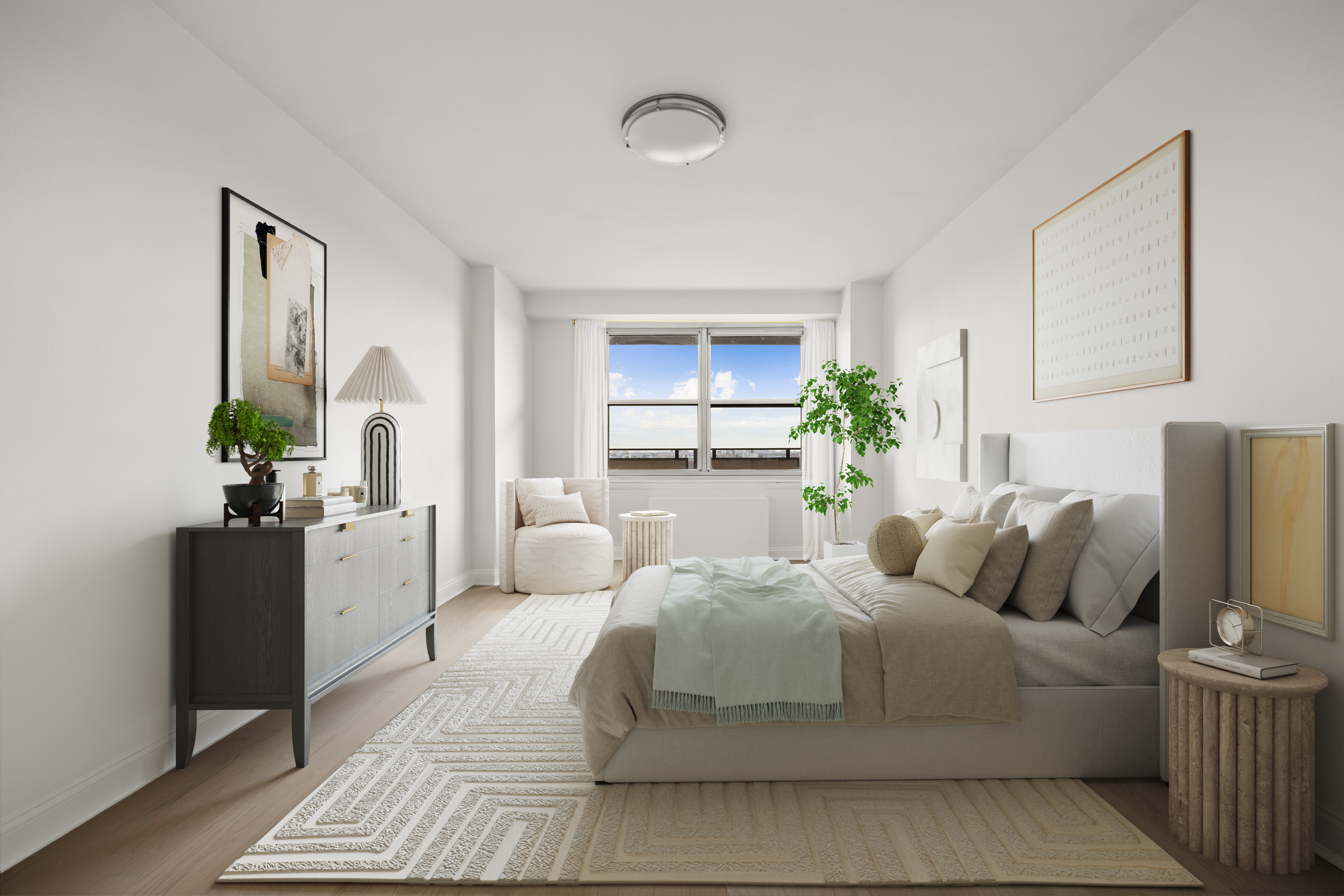 135 Ocean Parkway, Unit 16N Brooklyn, NY 11218 - Photo 10 of 16 a bedroom with a large bed and a couch