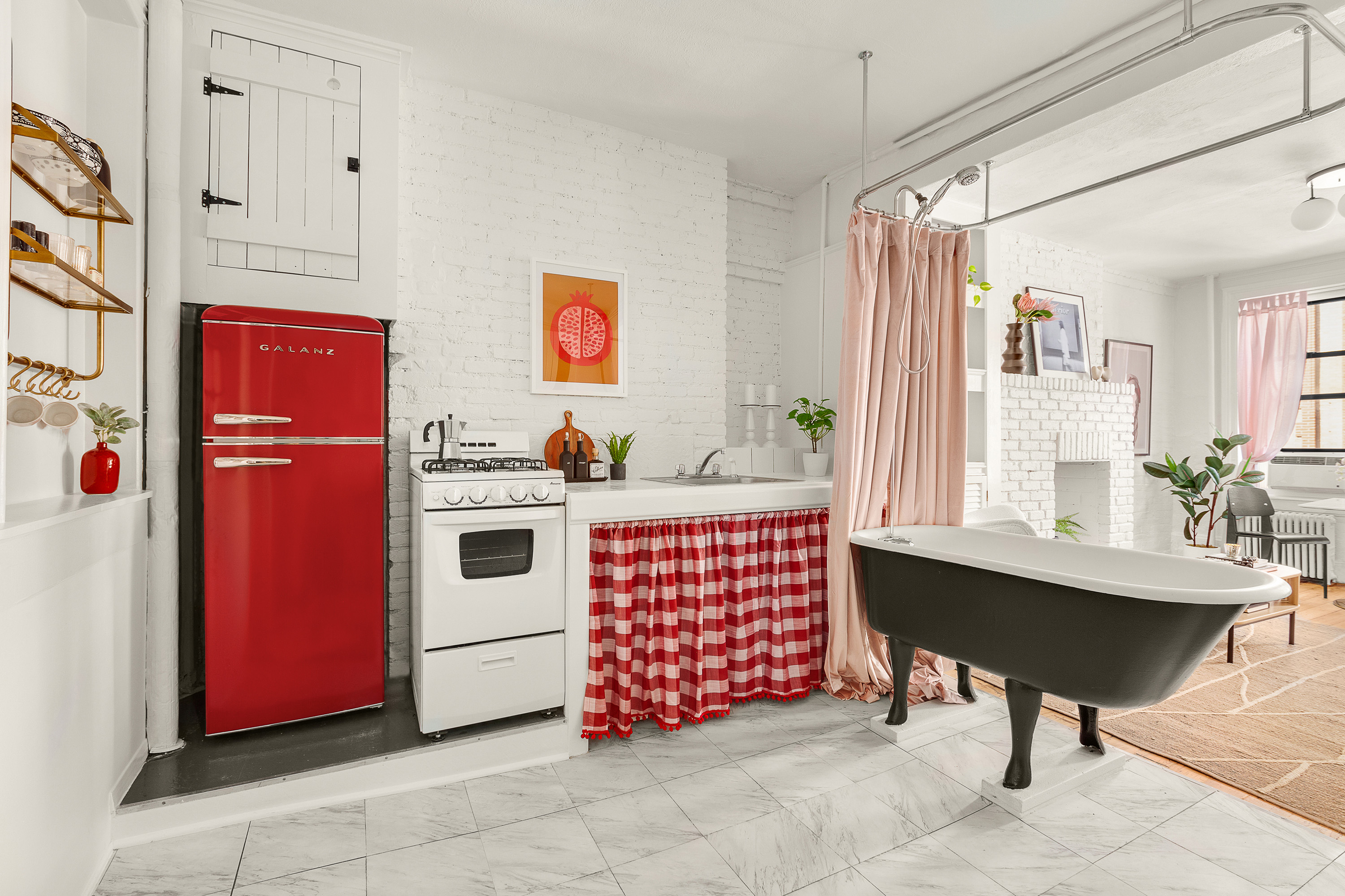 24 Cornelia Street, Unit 15 Manhattan, NY 10014 - Photo 6 of 13 a living room with furniture and a table