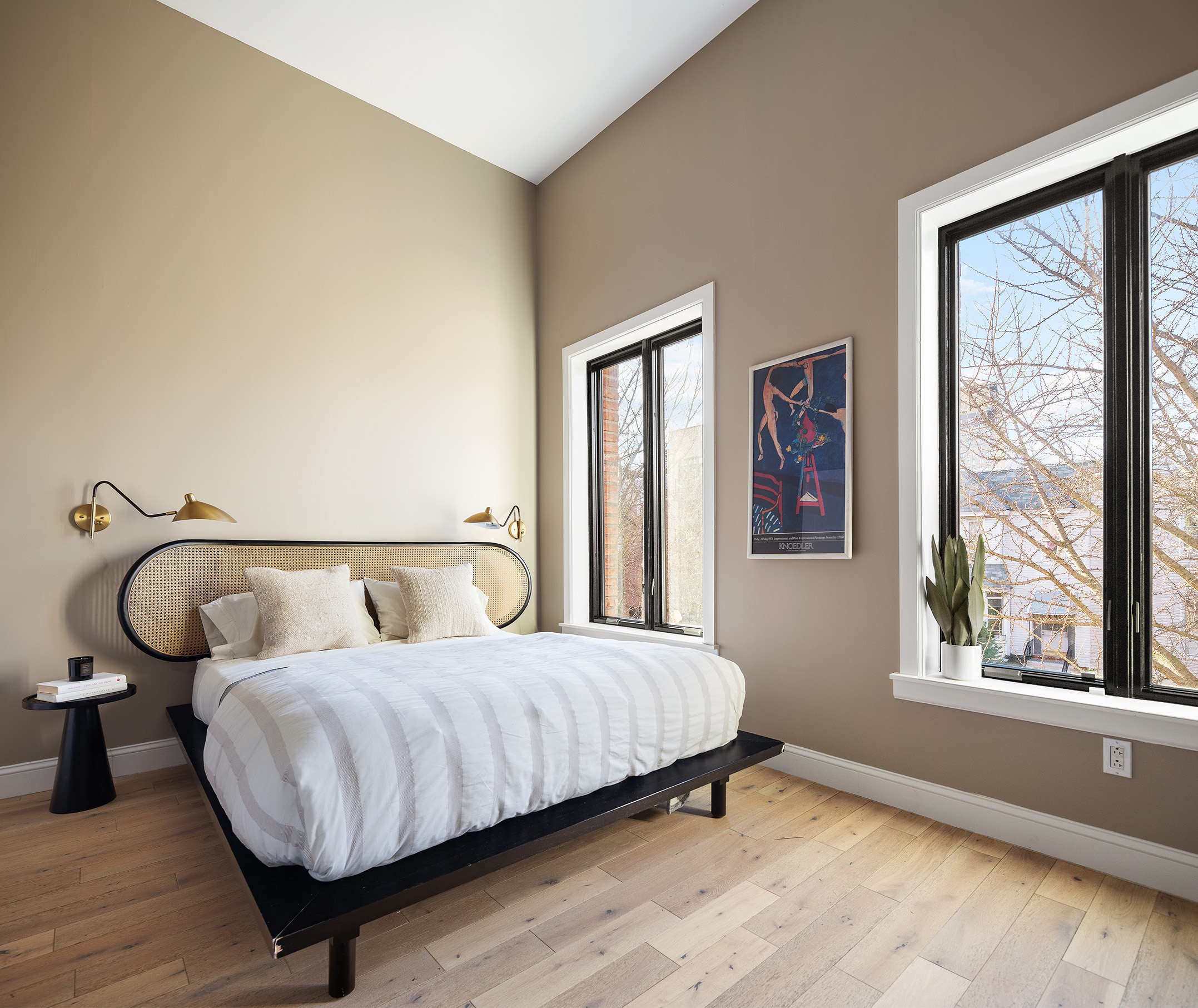 34 Woodbine Street Brooklyn, NY 11221 - Photo 8 of 15 a bedroom with a bed and a large window