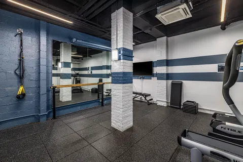 a kitchen with a sink and a stove top oven