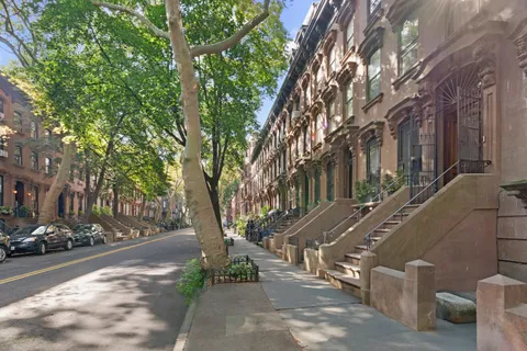 a view of a city street from a building