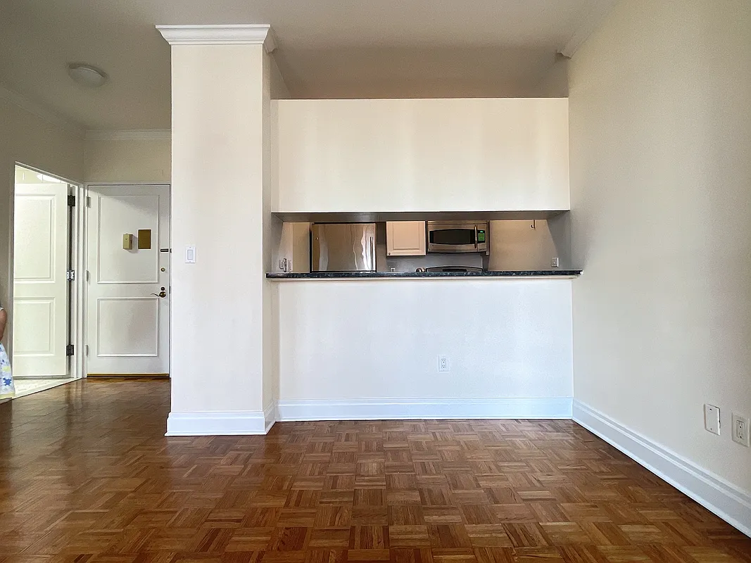 400 East 90th Street, Unit 15B Manhattan, NY 10128 - Photo 2 of 15 a view of a room with wooden floor