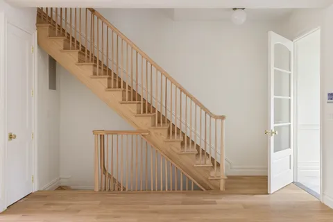 a view of entryway with wooden floor