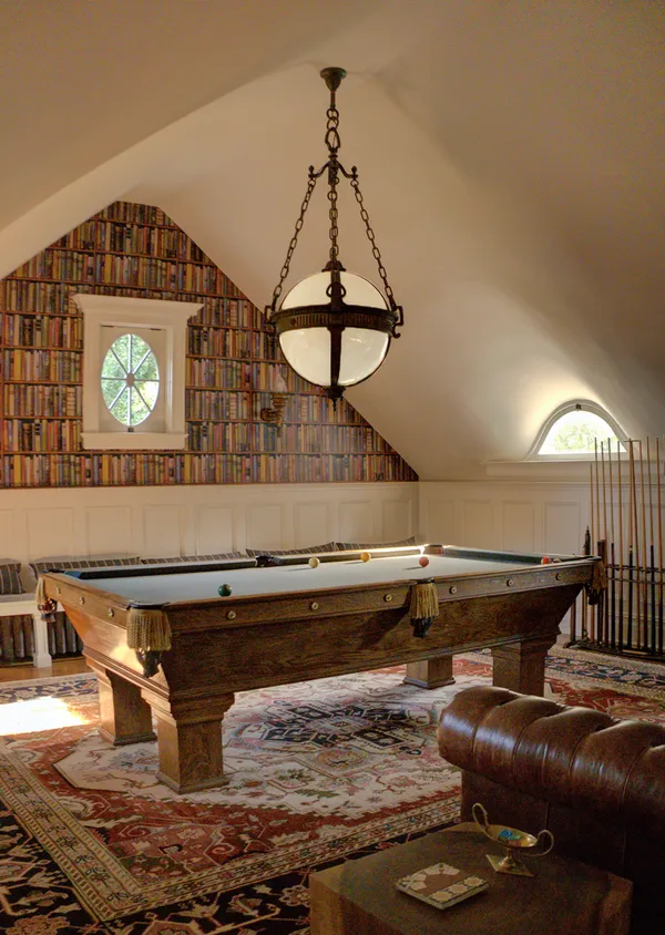 a view of an entryway wooden floor and a rug