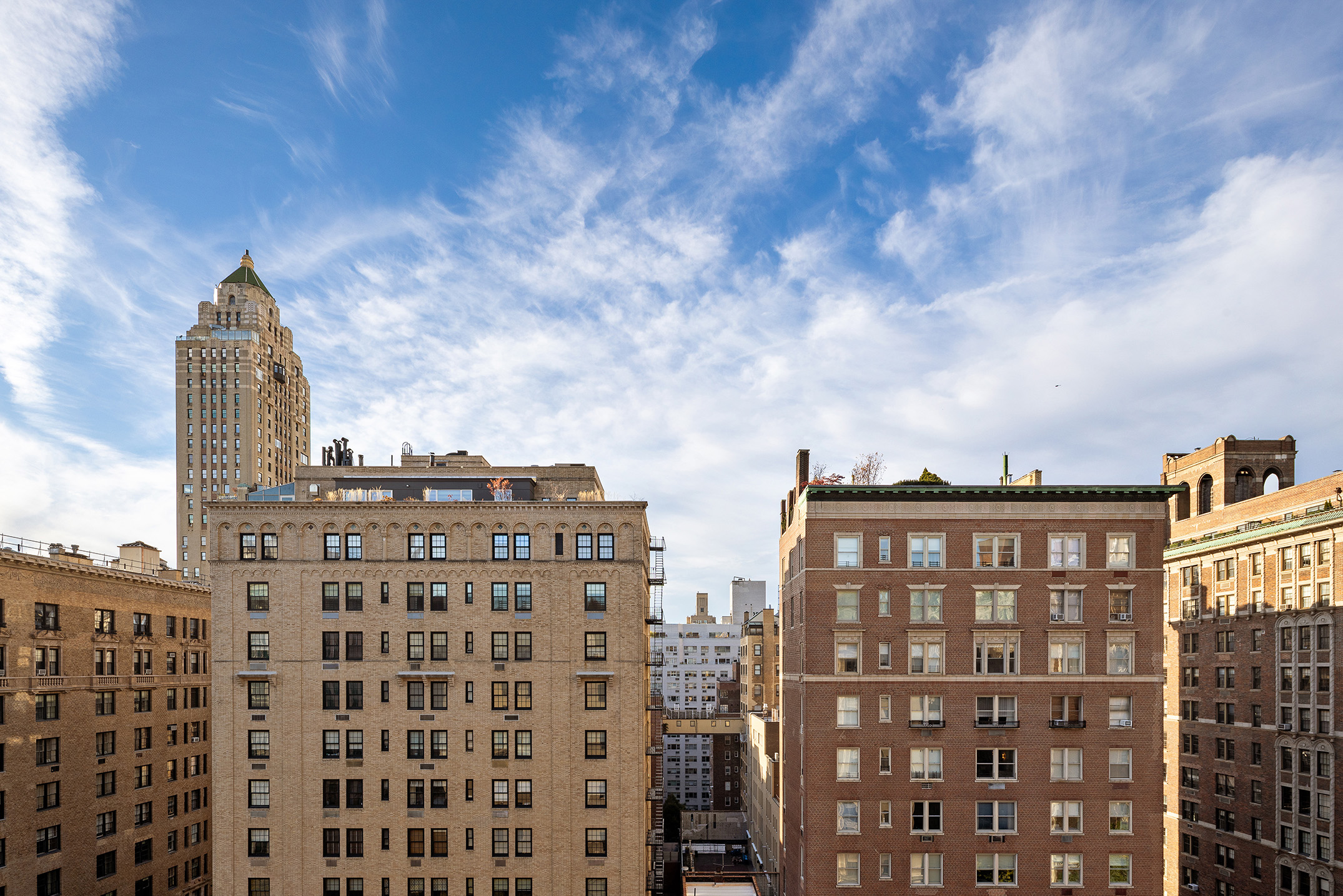 875 Park Avenue, Unit 11C Manhattan, NY 10075 - Photo 18 of 25 a view of a city with tall buildings