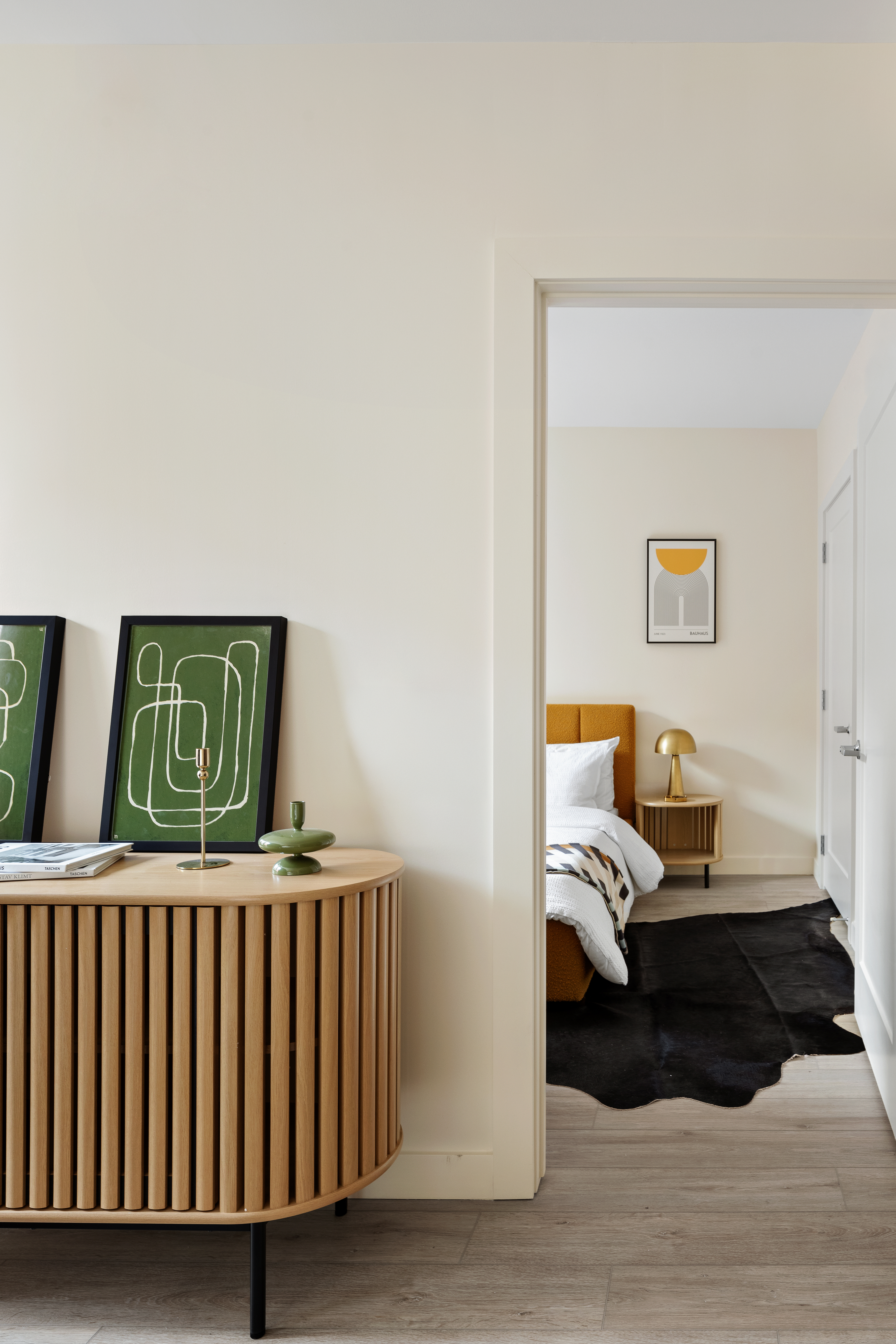 130 East 177th Street, Unit 11F Bronx, NY 10453 - Photo 5 of 18 a bedroom with a bed and furniture