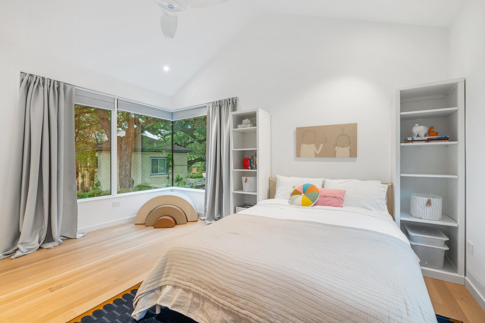 1206 Bickler Road Austin, TX 78704 - Photo 49 of 65 a bedroom with a bed and a large window