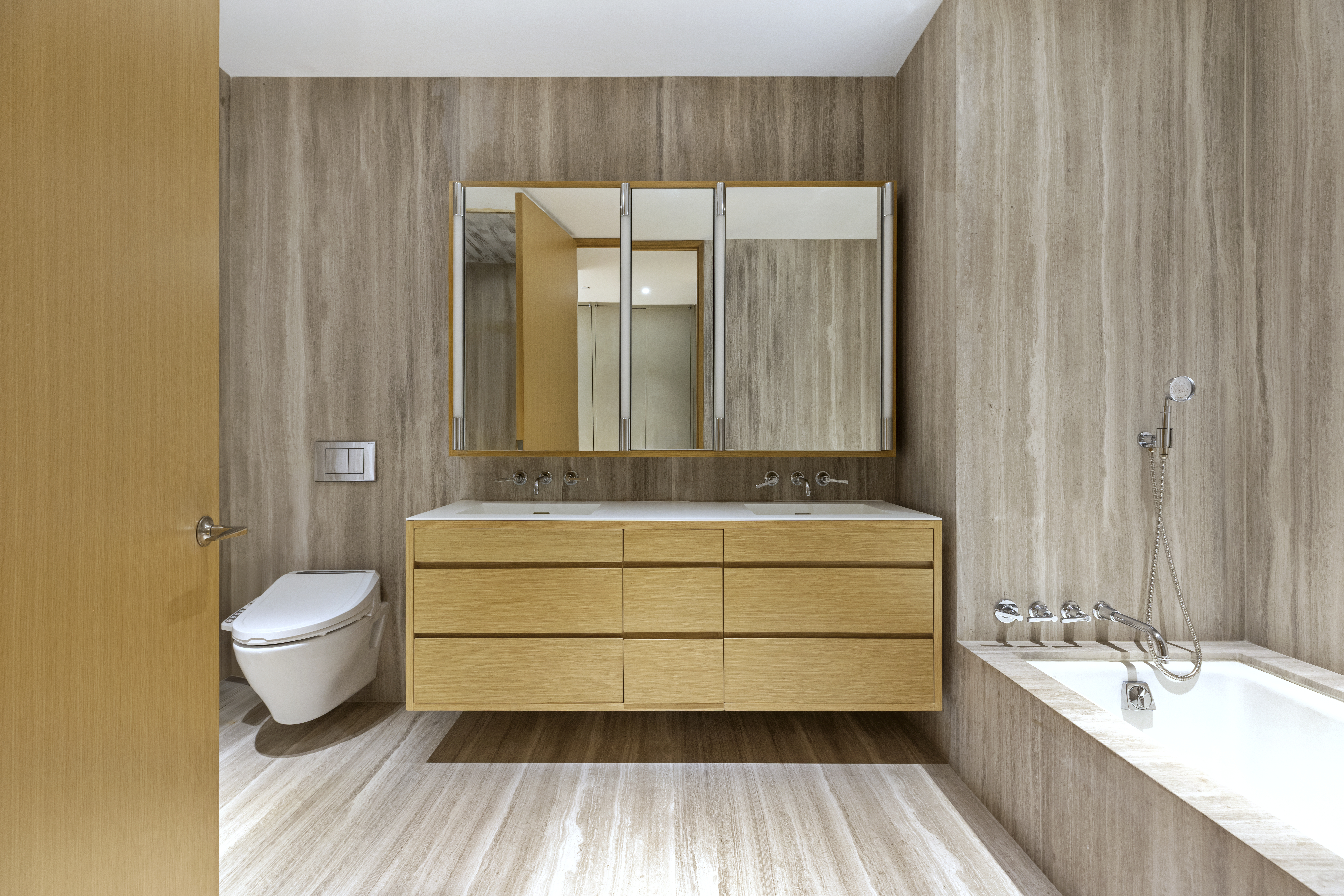 71 Reade Street, Unit 5A Manhattan, NY 10007 - Photo 14 of 27 a bathroom with a granite countertop sink mirror vanity and toilet