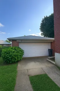 a view of a back yard of the house