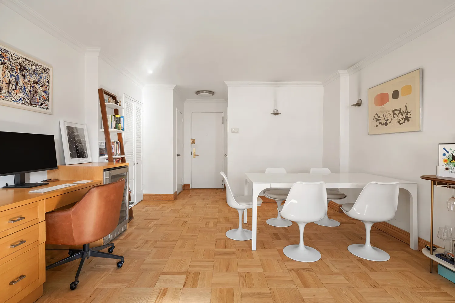 a view of a workspace with furniture