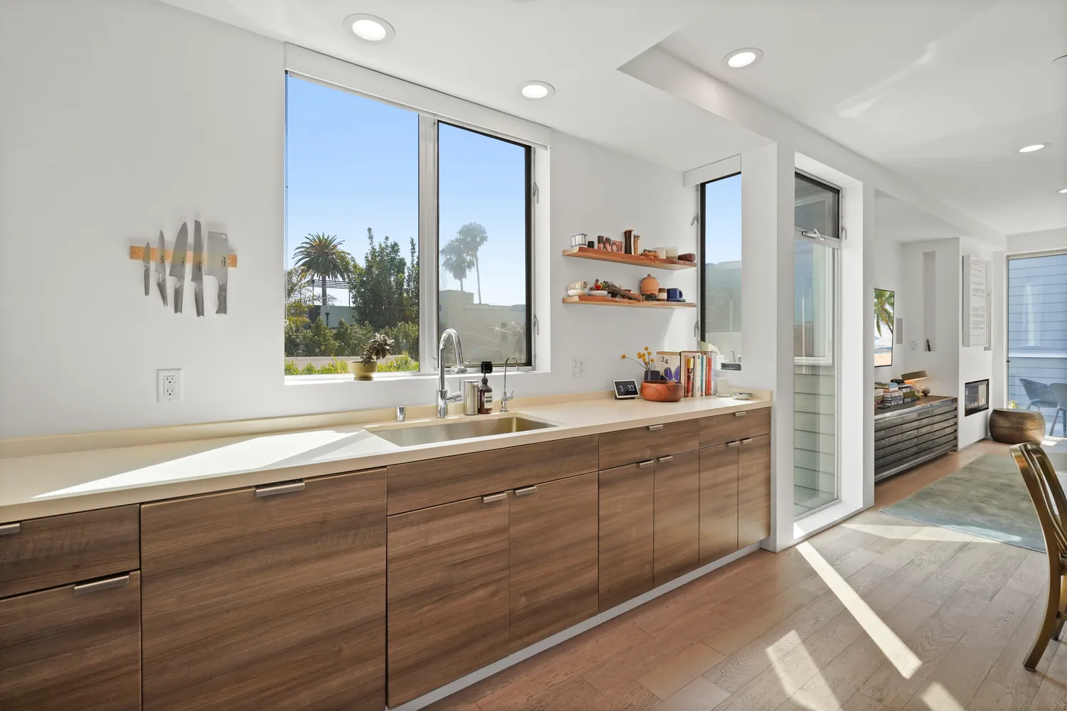 a spacious bathroom with a sink a mirror and a shower