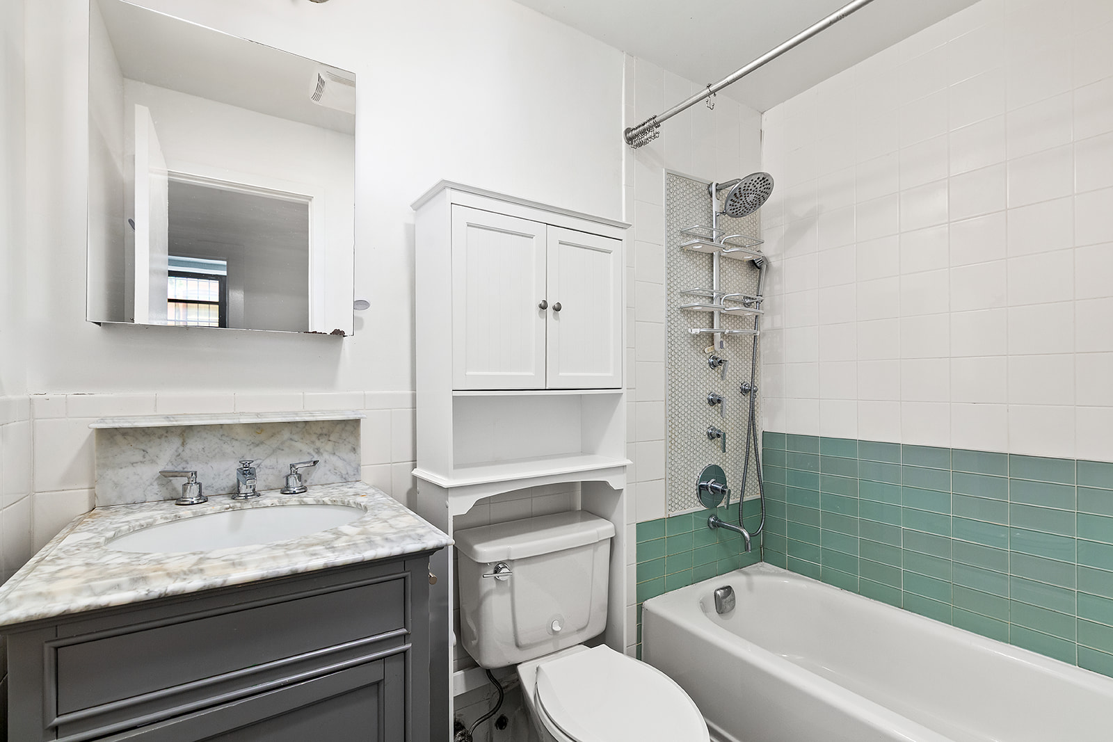 372 Dekalb Avenue, Unit 1I Brooklyn, NY 11205 - Photo 8 of 11 a bathroom with a granite countertop sink toilet and shower