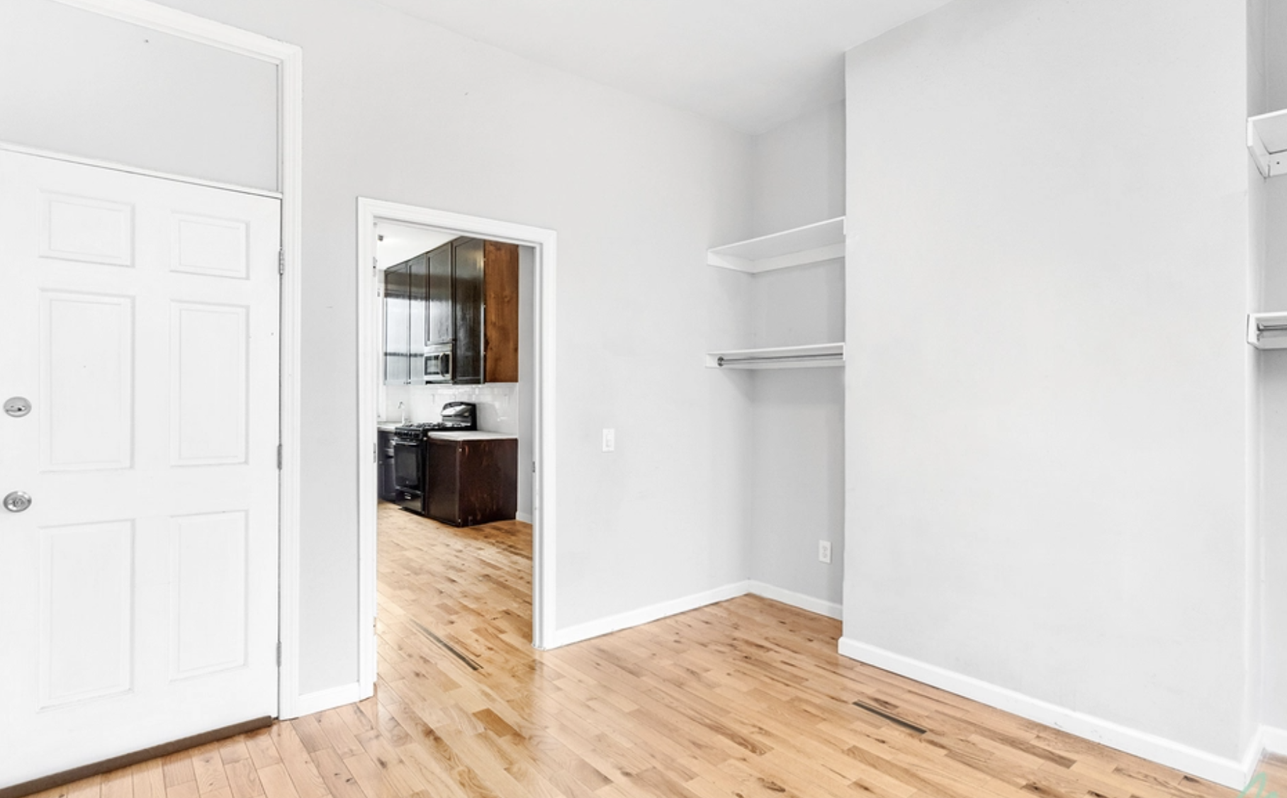 22-18 41st Street, Unit 2R Queens, NY 11105 - Photo 2 of 10 a view of a living room with a wooden floor