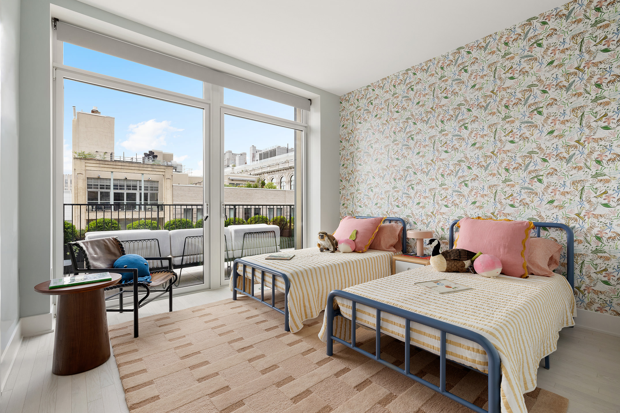 91 Leonard Street, Unit 14A Manhattan, NY 10013 - Photo 14 of 27 a bed room with two beds and a large window