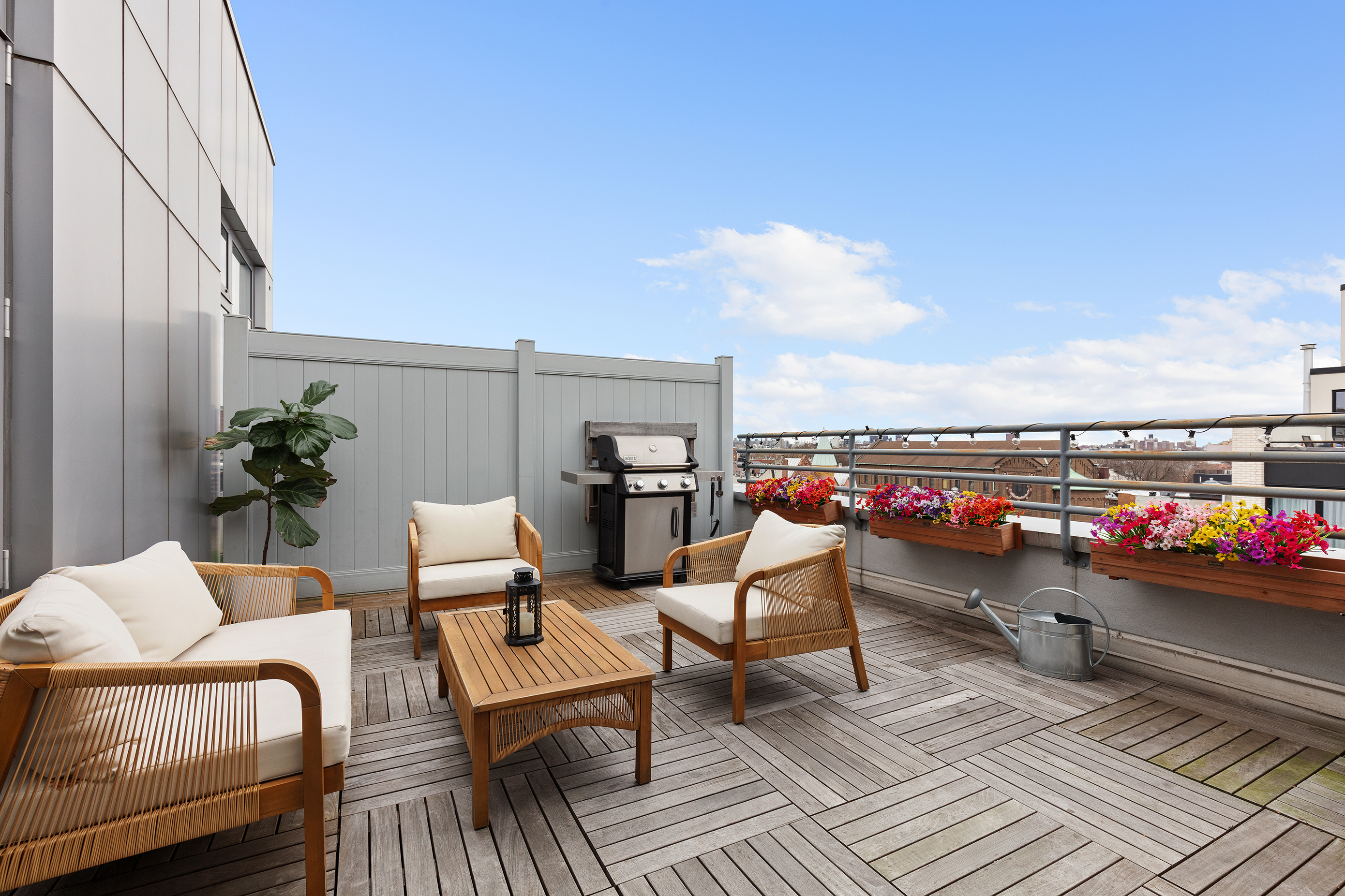 82 Irving Place, Unit 7C Brooklyn, NY 11238 - Photo 4 of 16 a balcony with wooden floor and outdoor seating