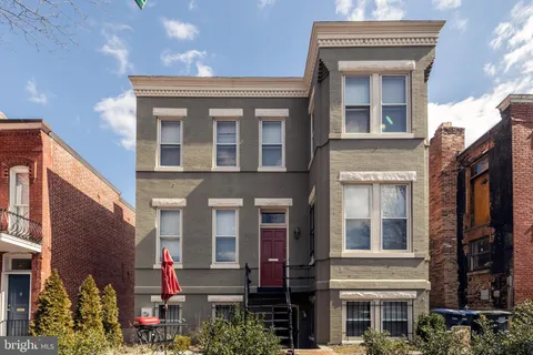a front view of a multi story residential apartment building