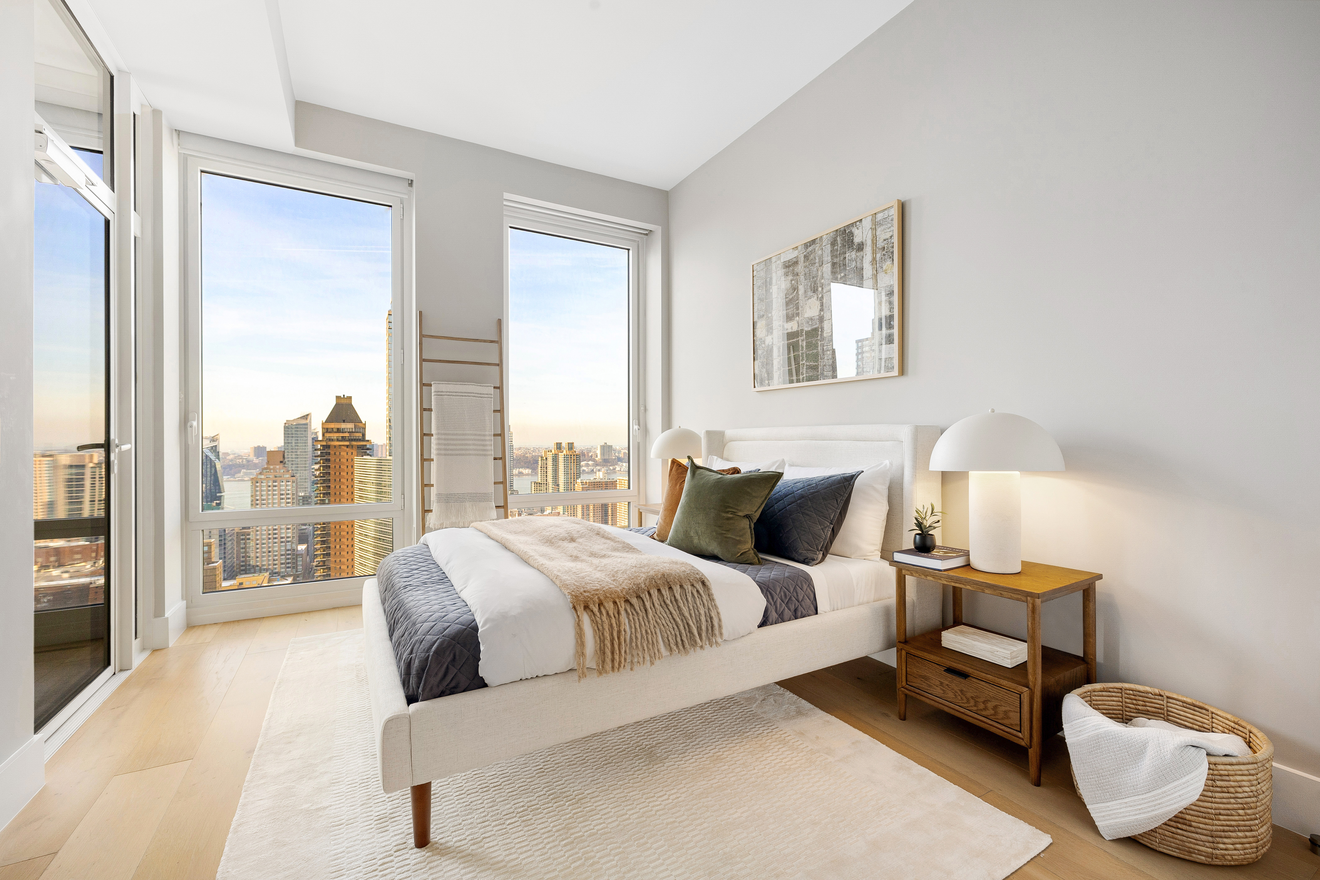 15 West 61st Street, Unit PH1C Manhattan, NY 10023 - Photo 20 of 26 a bedroom with a bed and glass window