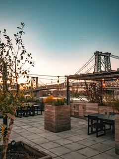 a view of a balcony with chairs