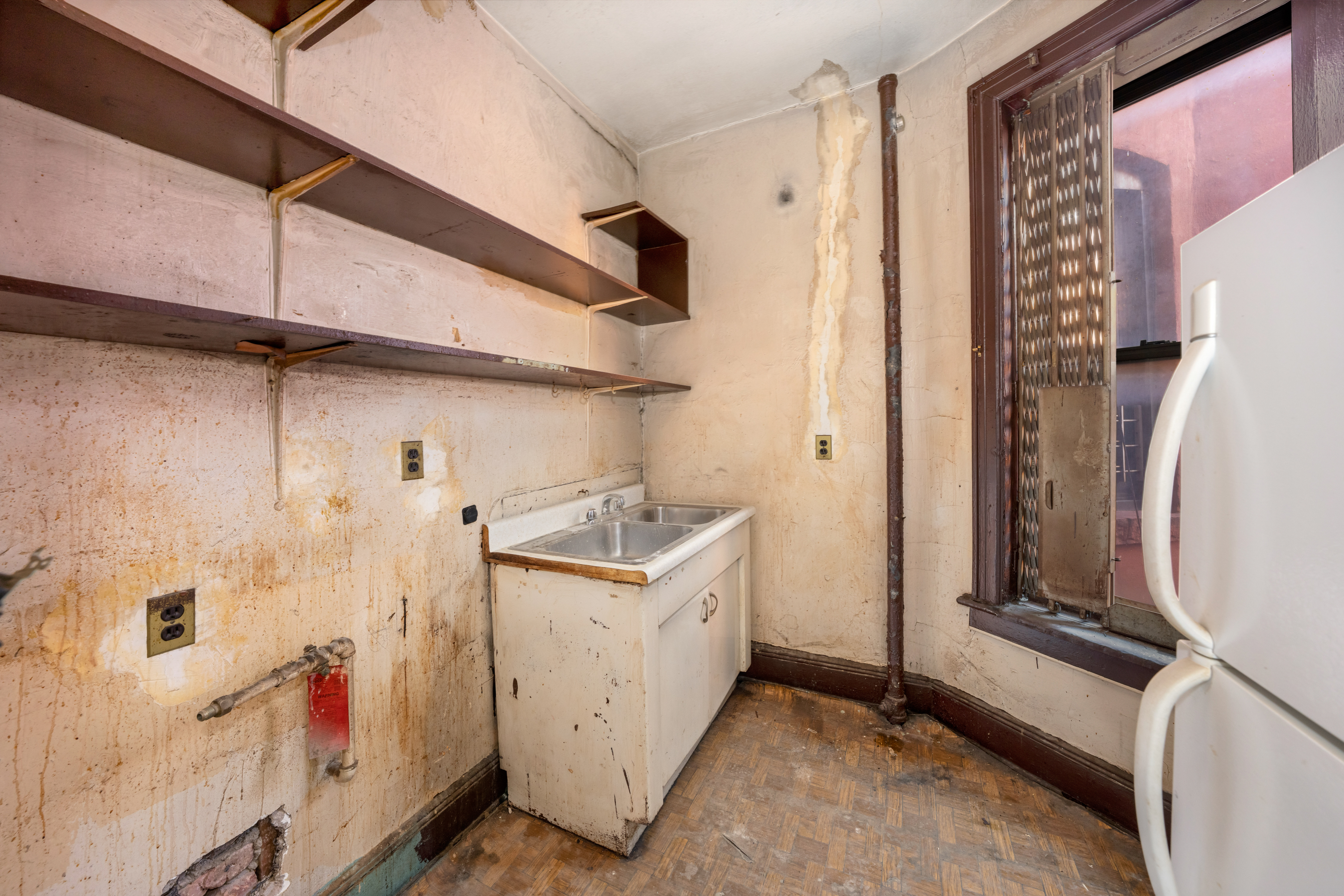 13 West 106th Street, Unit 4A Manhattan, NY 10025 - Photo 5 of 8 a bathroom with a sink a vanity and shower