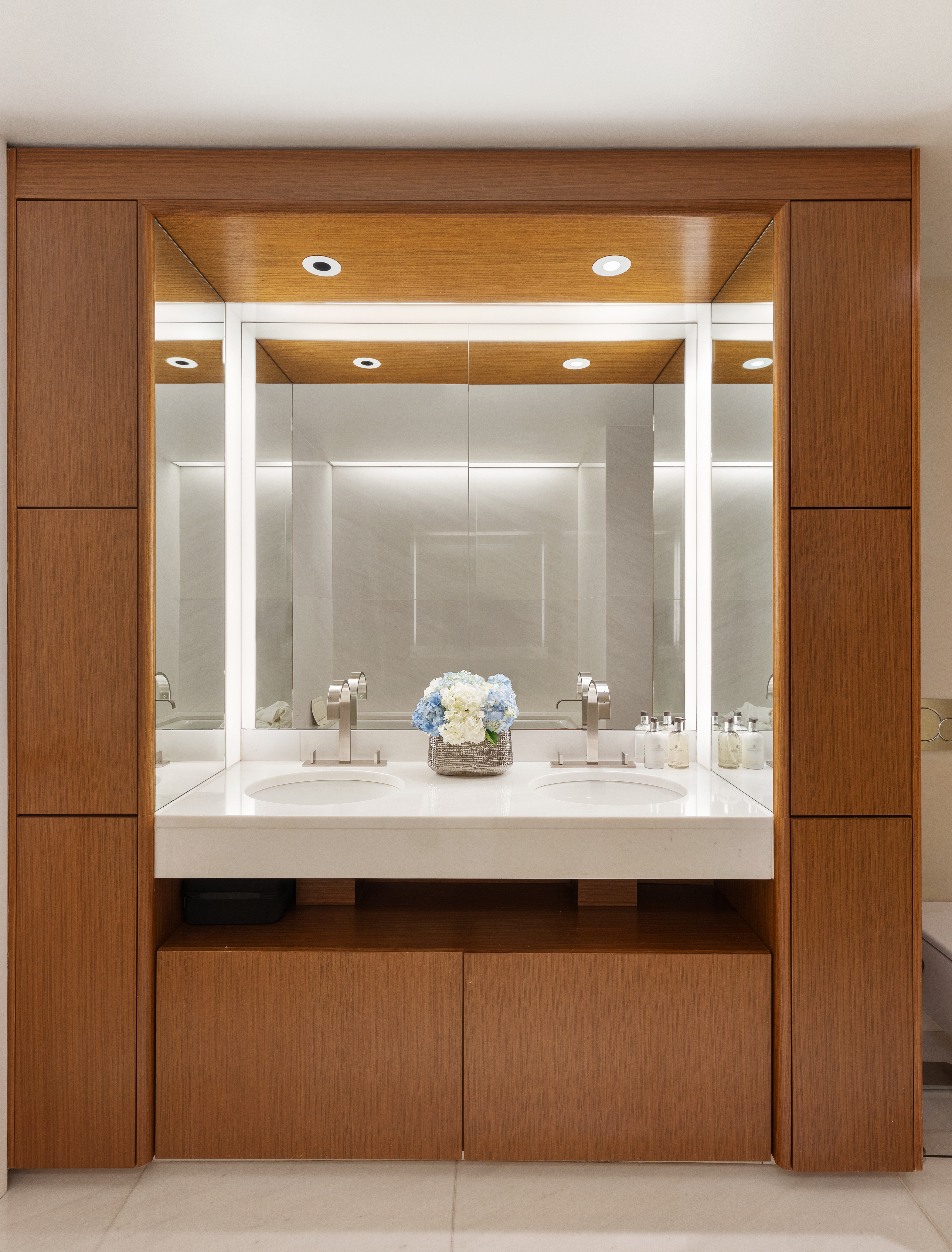 50 United Nations Plaza, Unit 6B Manhattan, NY 10017 - Photo 8 of 13 a bathroom with a sink and a mirror