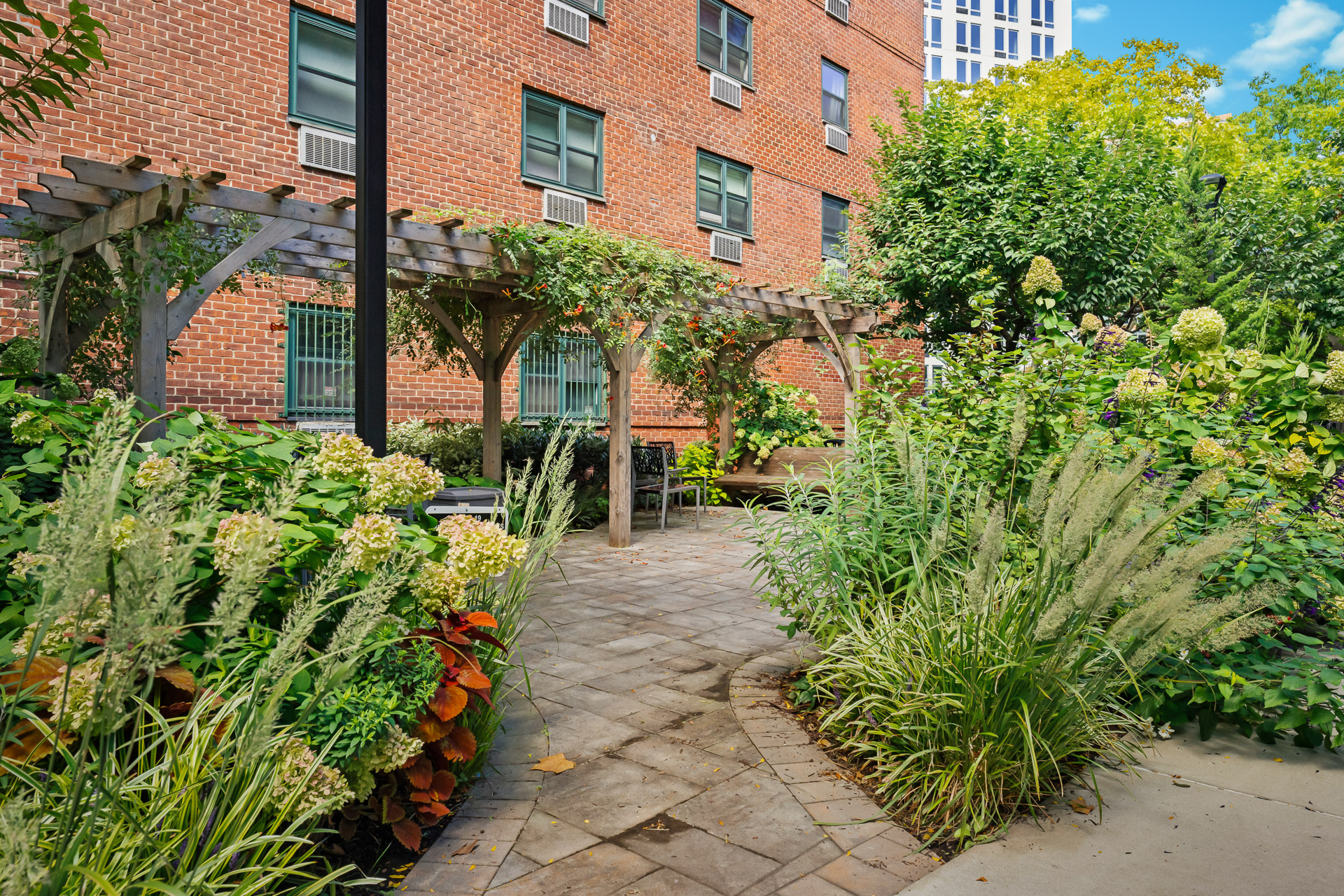 175 Willoughby Street, Unit 14N Brooklyn, NY 11201 - Photo 15 of 18 a view of a pathway both side of the house