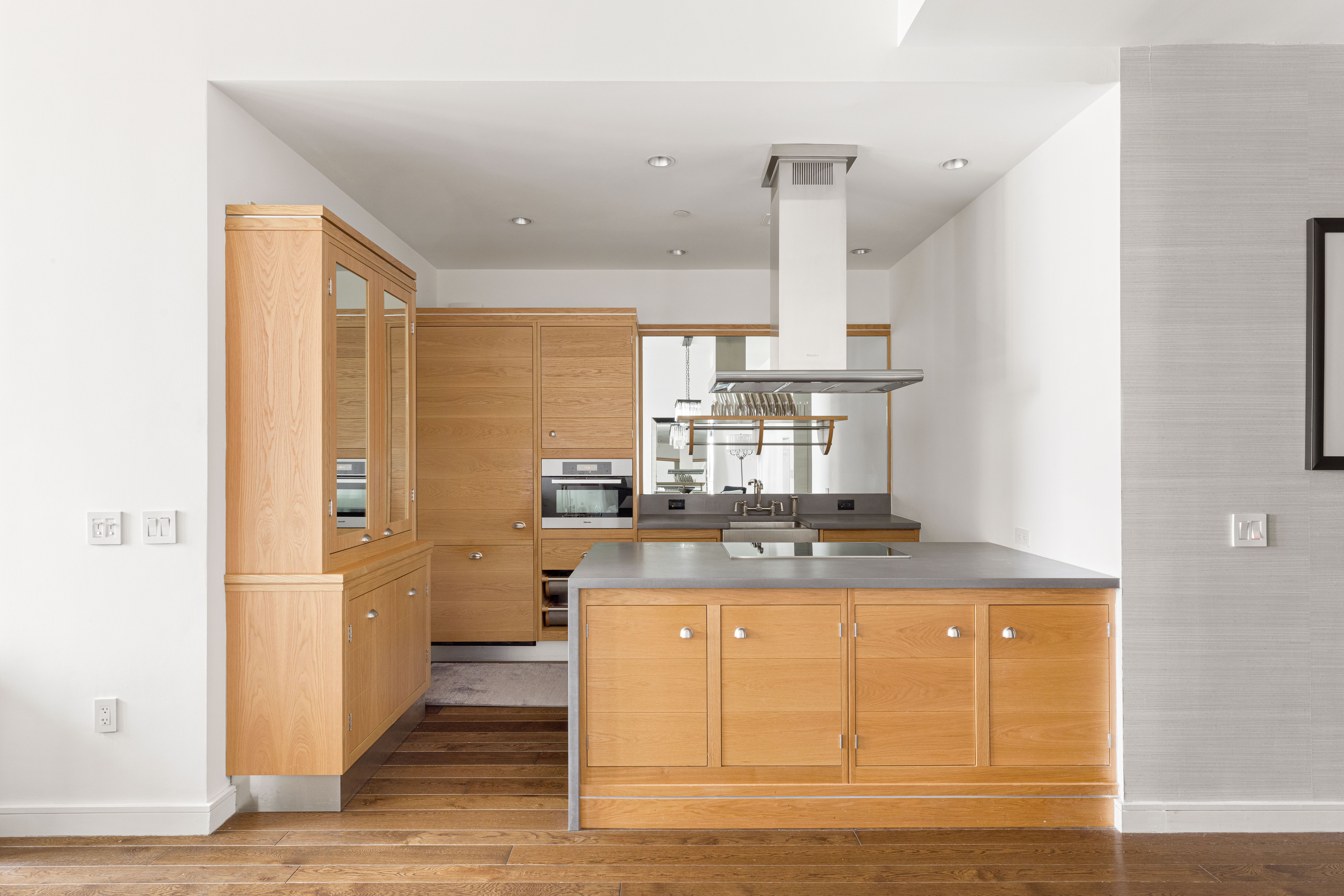 425 West 50th Street, Unit 15G Manhattan, NY 10019 - Photo 5 of 14 a view of a kitchen with a sink