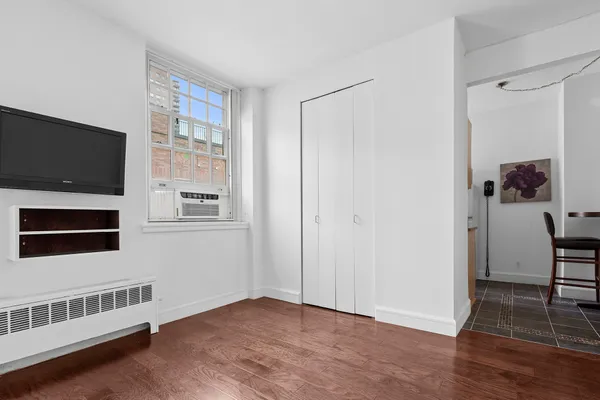 a view of livingroom with furniture and workspace