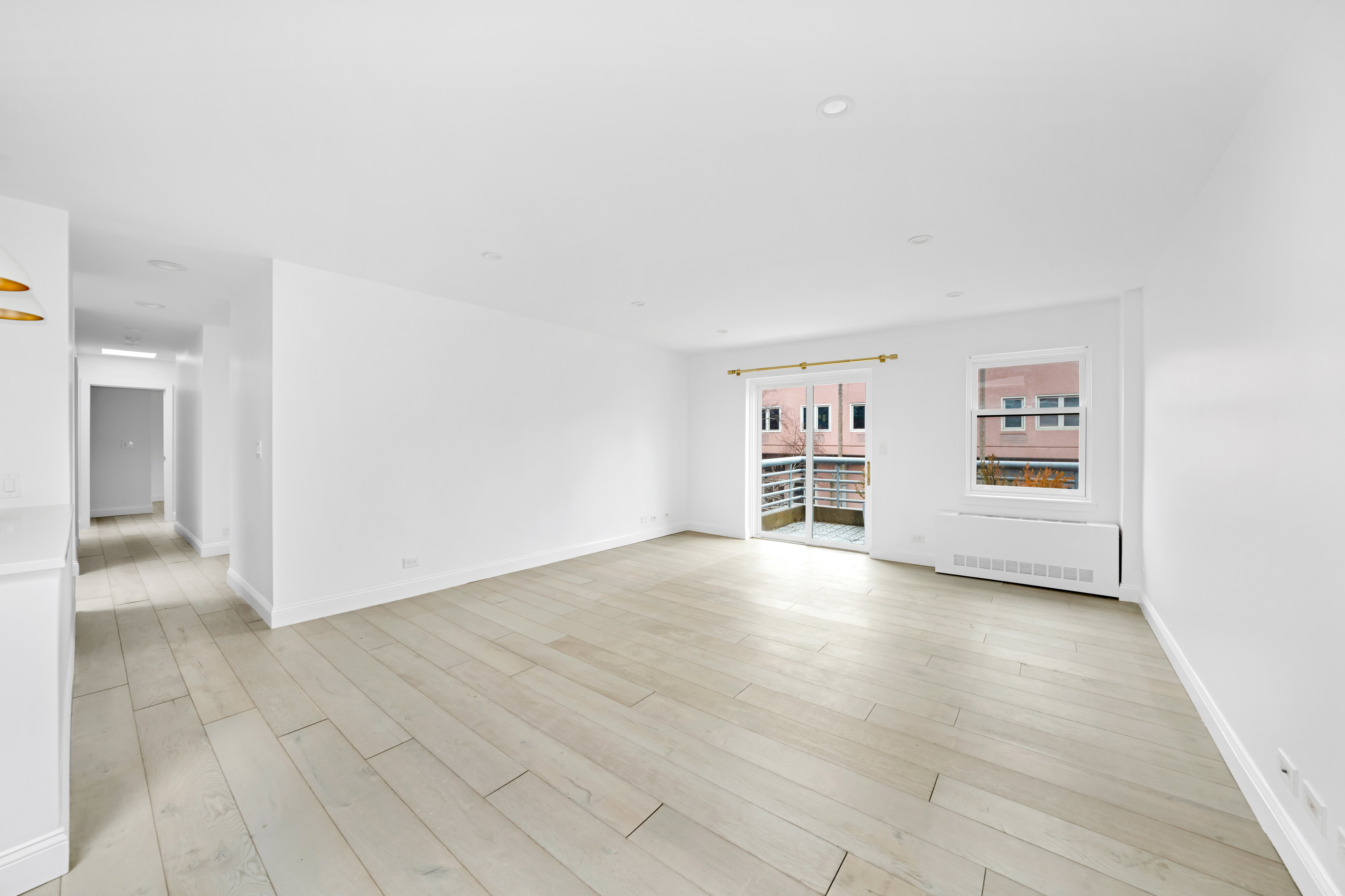 110 West 90th Street, Unit 5C Manhattan, NY 10024 - Photo 2 of 15 a view of a hallway with wooden floor and a cabinet