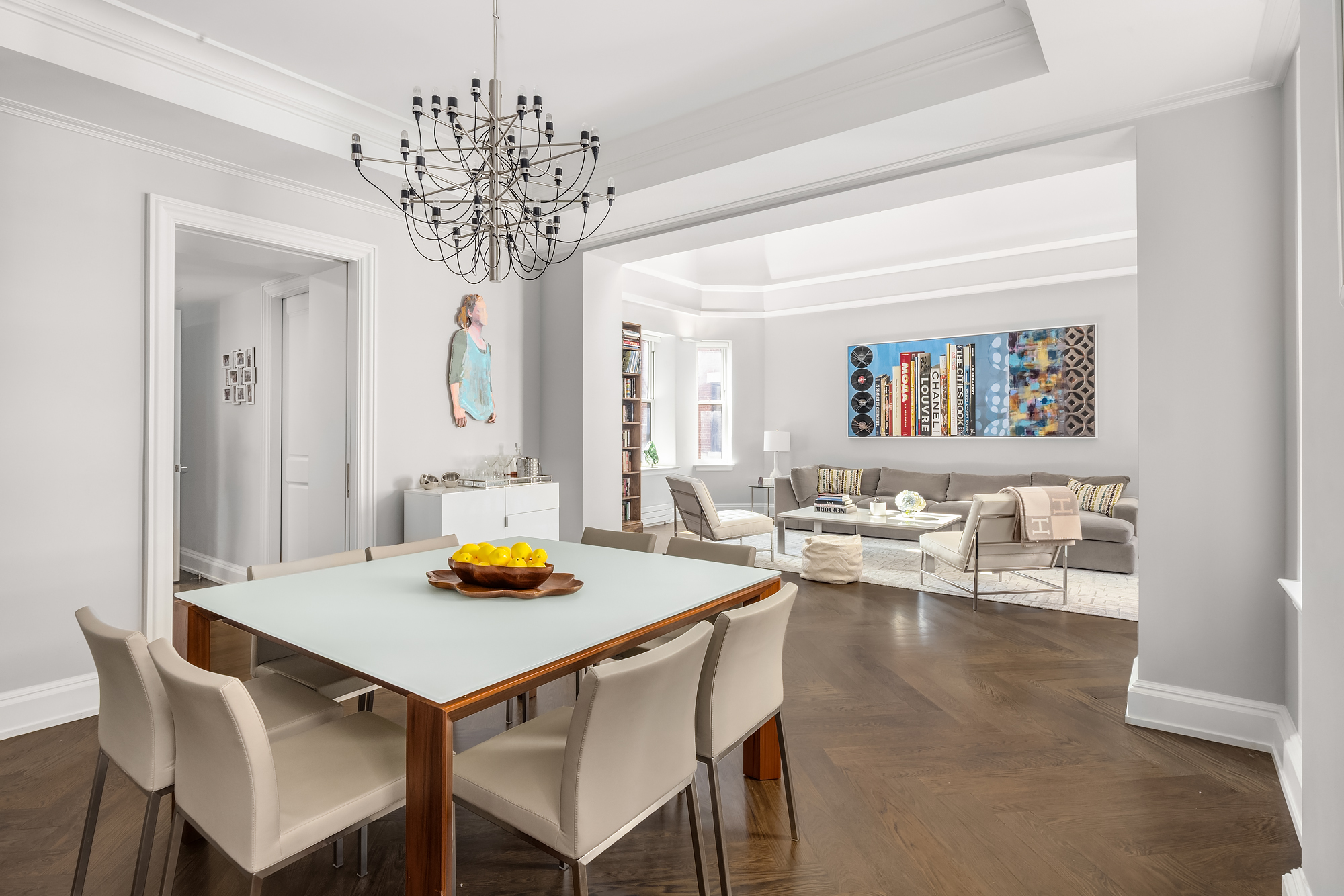 344 West 72nd Street, Unit 1007 Manhattan, NY 10023 - Photo 5 of 23 a view of a dining room with furniture and wooden floor
