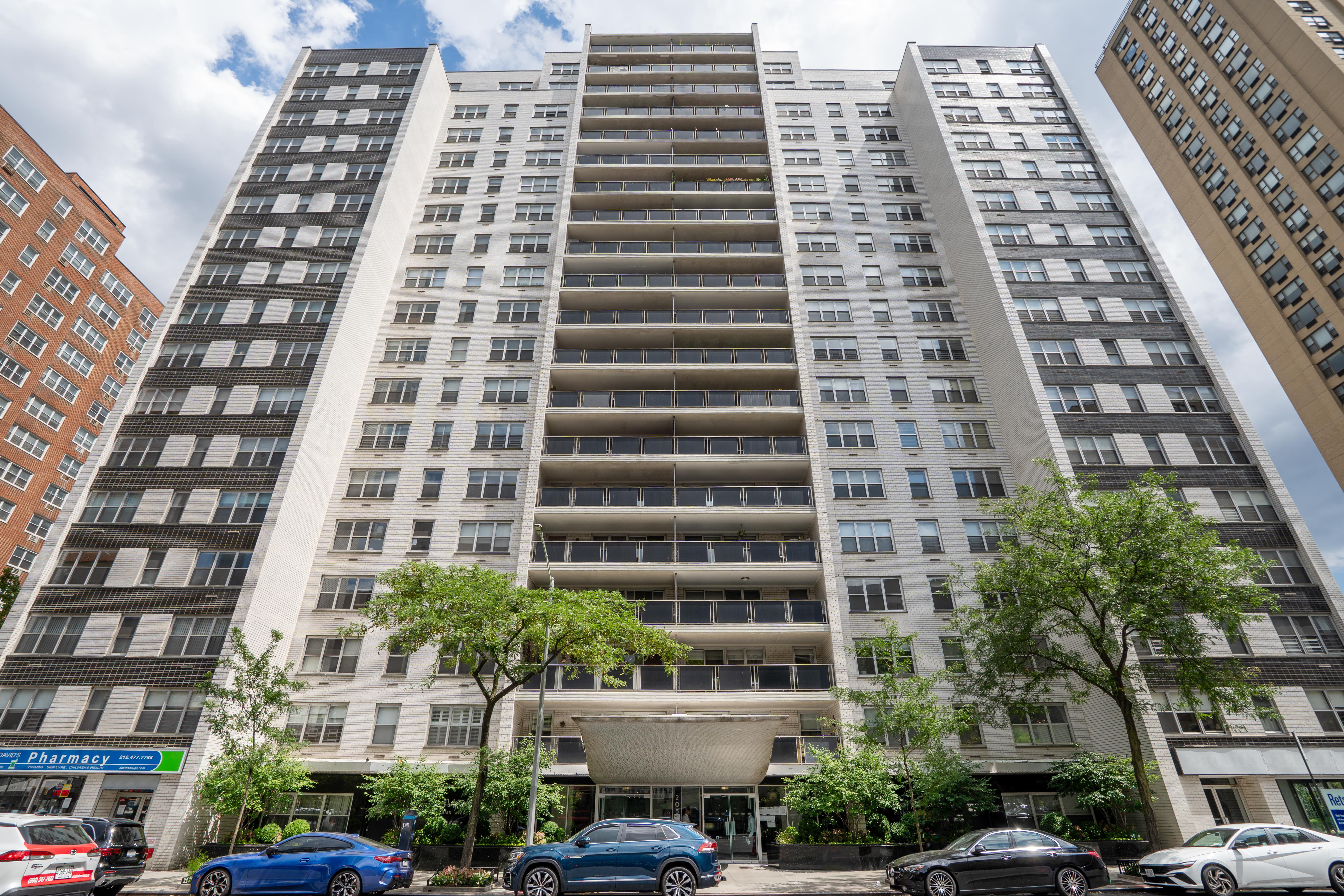 205 3rd Avenue, Unit 11T Manhattan, NY 10003 - Photo 13 of 20 front view of a building with a street