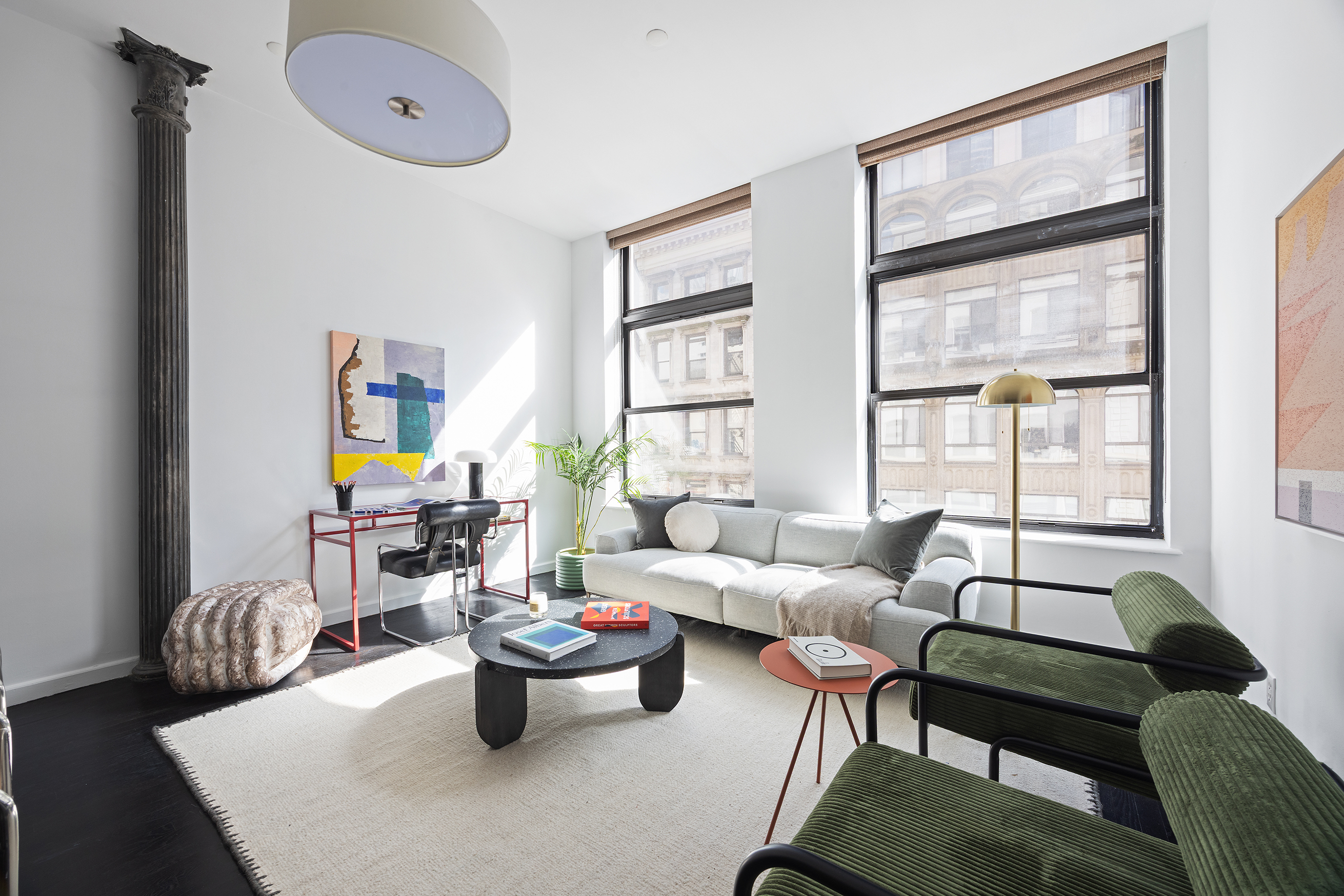 100 Reade Street, Unit 3C Manhattan, NY 10013 - Photo 1 of 9 a living room with furniture and a window