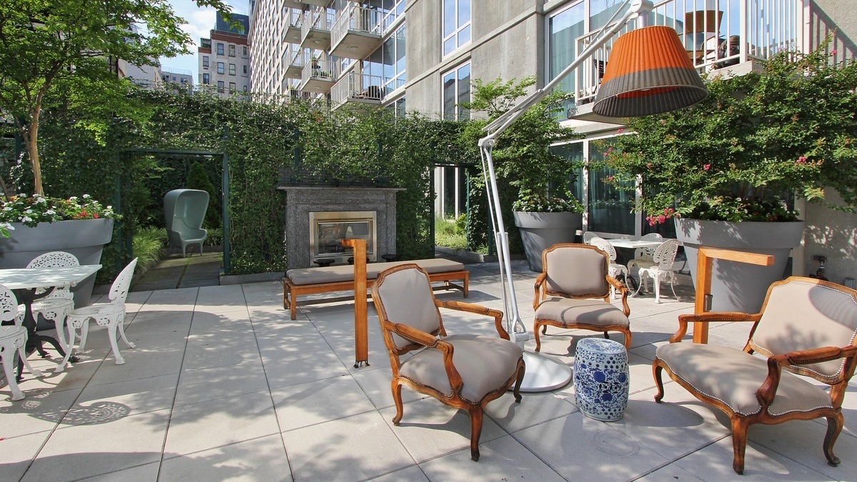 340 East 23rd Street, Unit 4D Manhattan, NY 10010 - Photo 15 of 19 a view of backyard with outdoor seating and plants