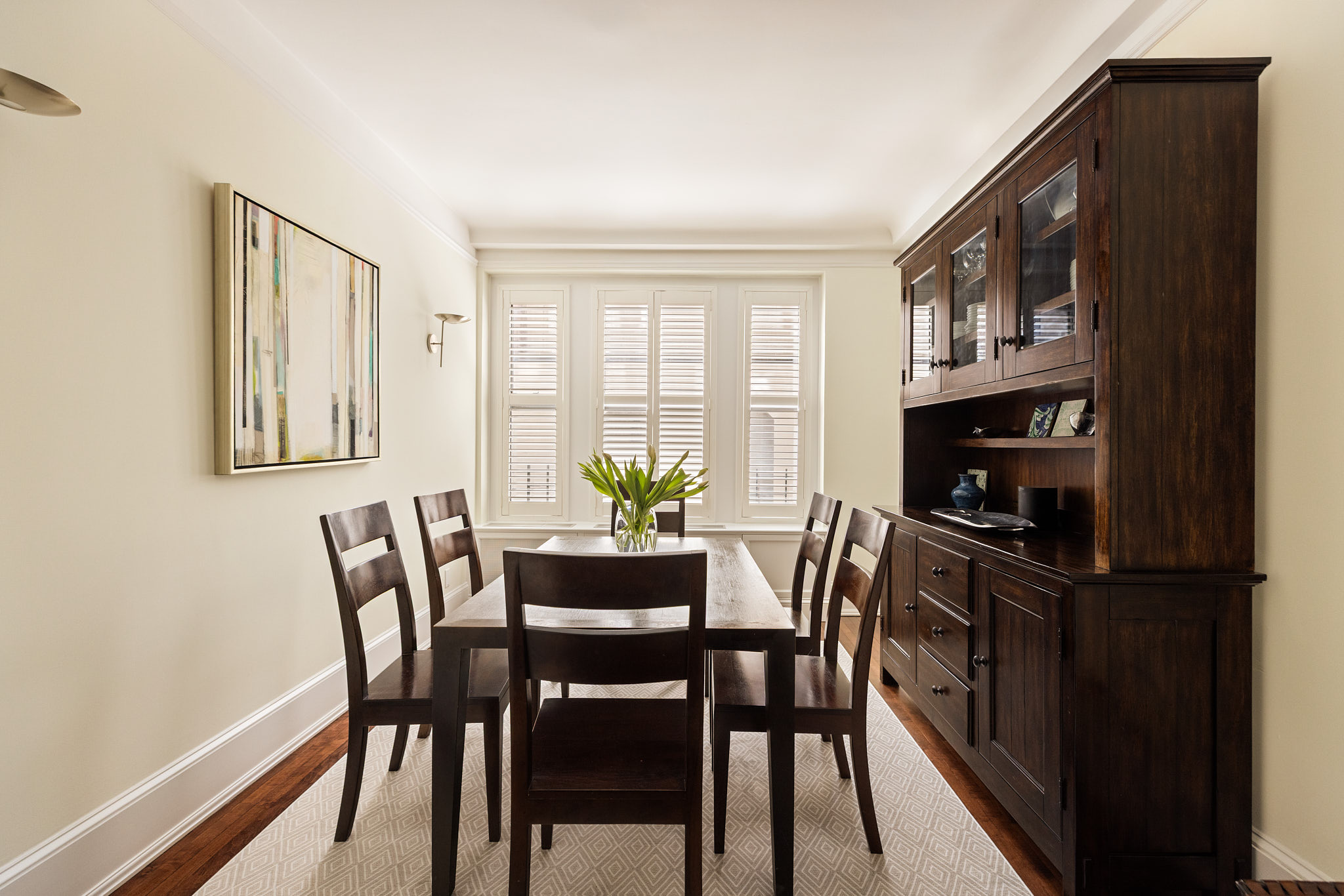 114 East 84th Street, Unit 3D Manhattan, NY 10028 - Photo 5 of 11 a dining room with furniture and window