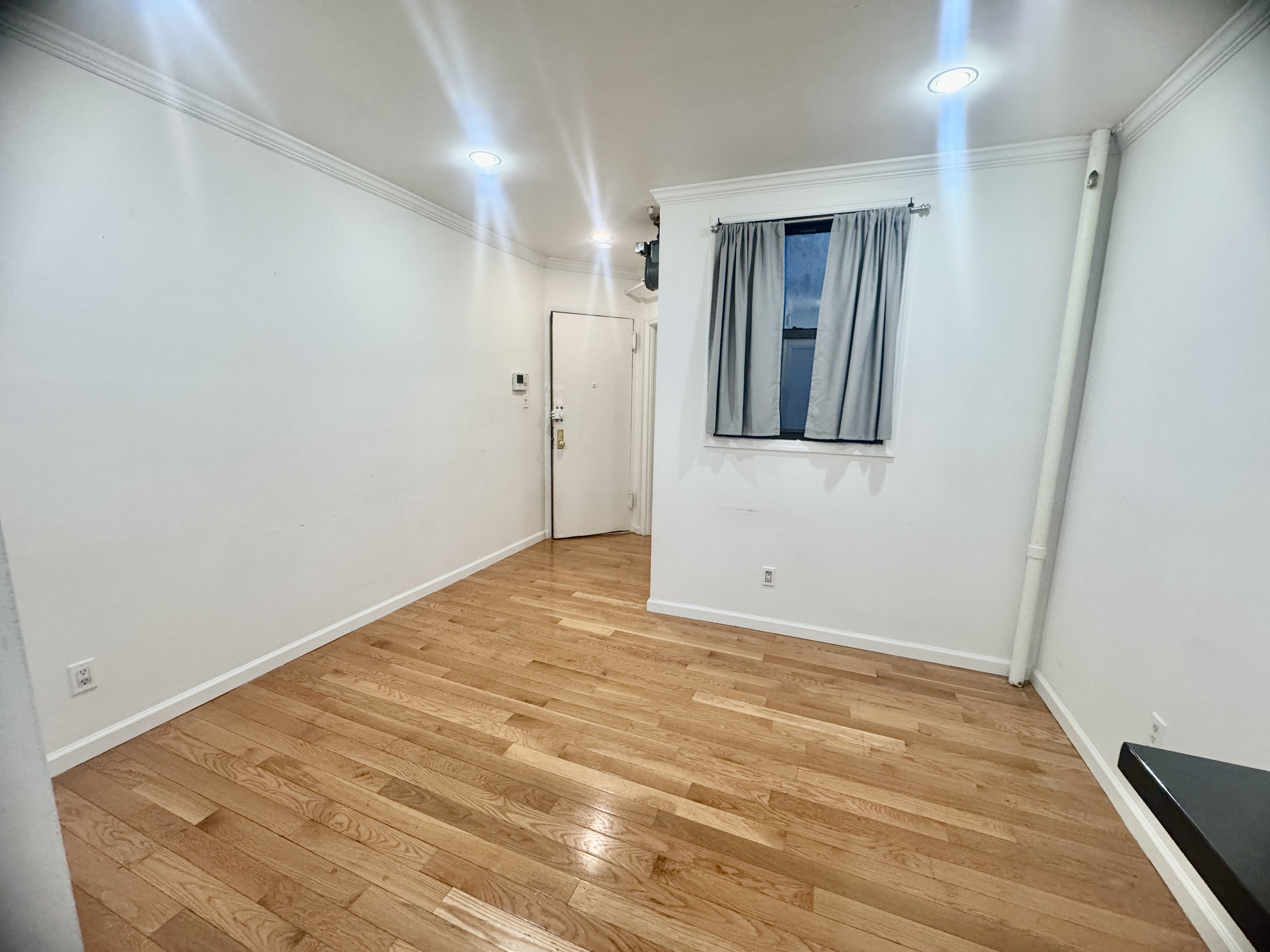 1773 1st Avenue, Unit 18 Manhattan, NY 10128 - Photo 5 of 10 a view of an empty room